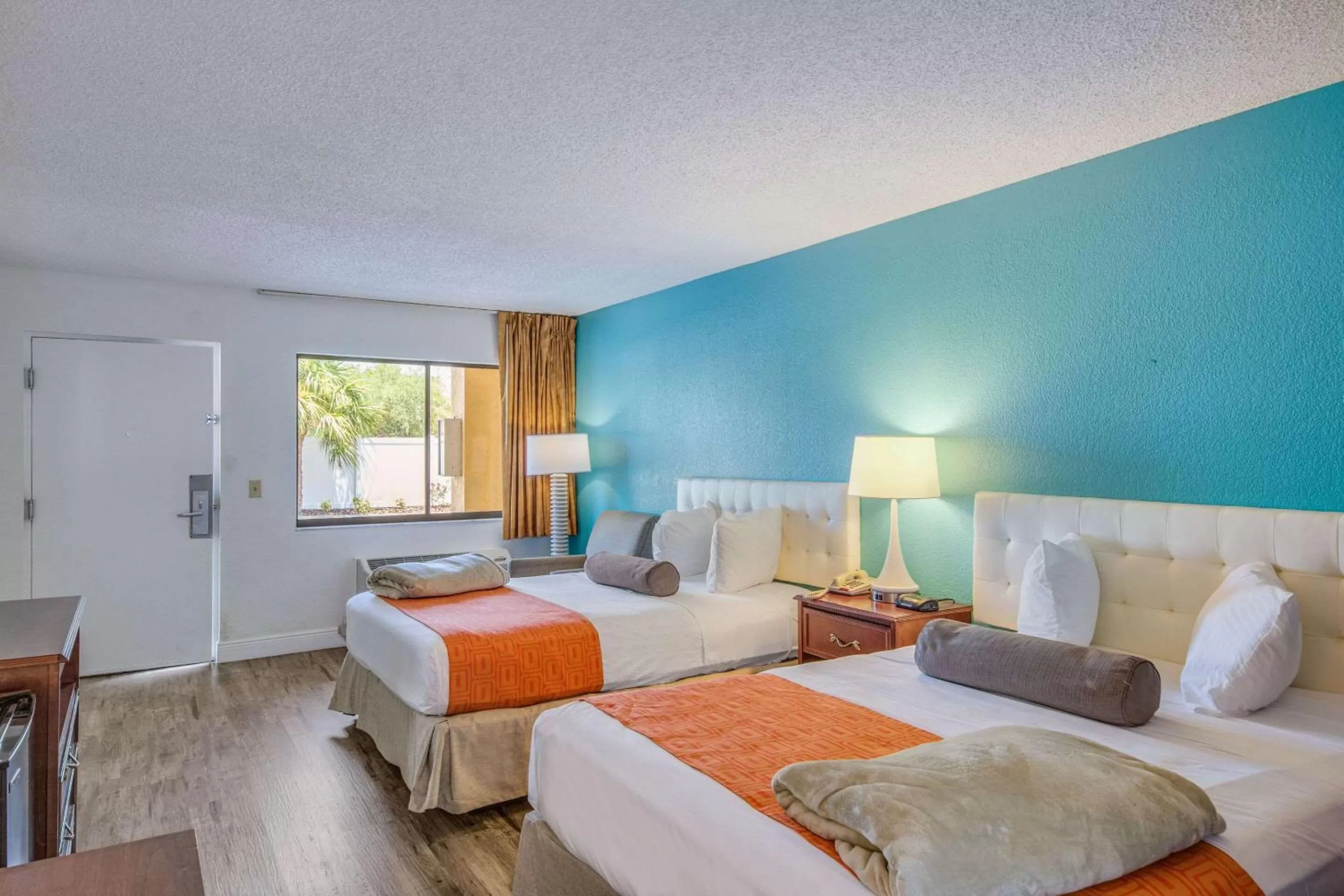 Photo of the whole room, Bed in Rodeway Inn Port Richey North