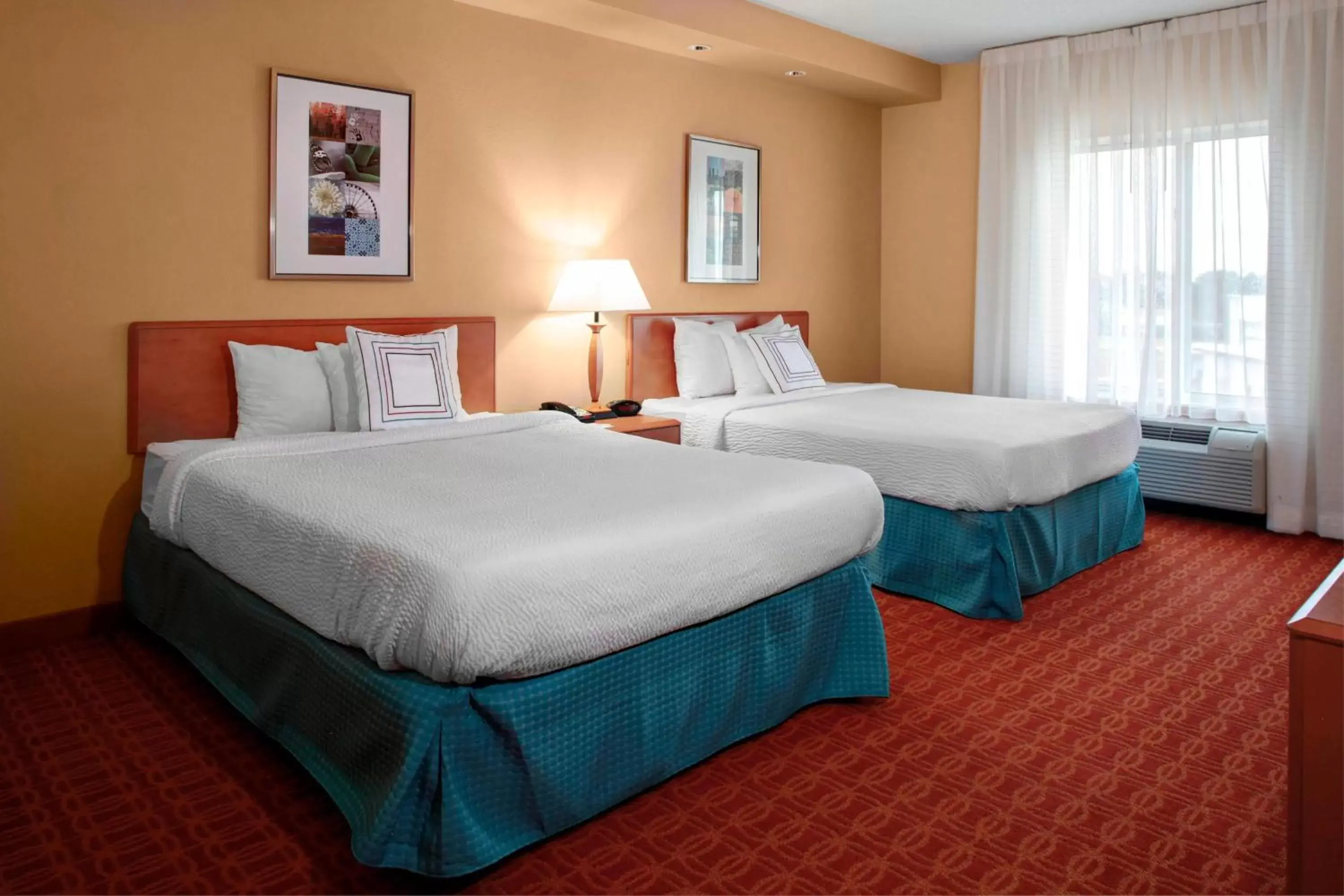 Photo of the whole room, Bed in Fairfield Inn & Suites Atlanta McDonough