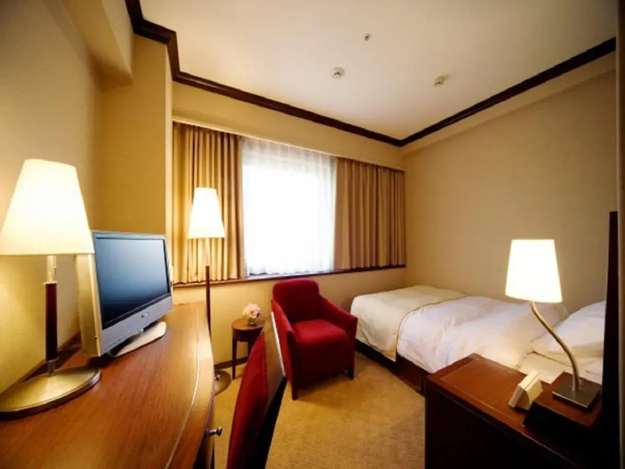 Bed in Okayama International Hotel