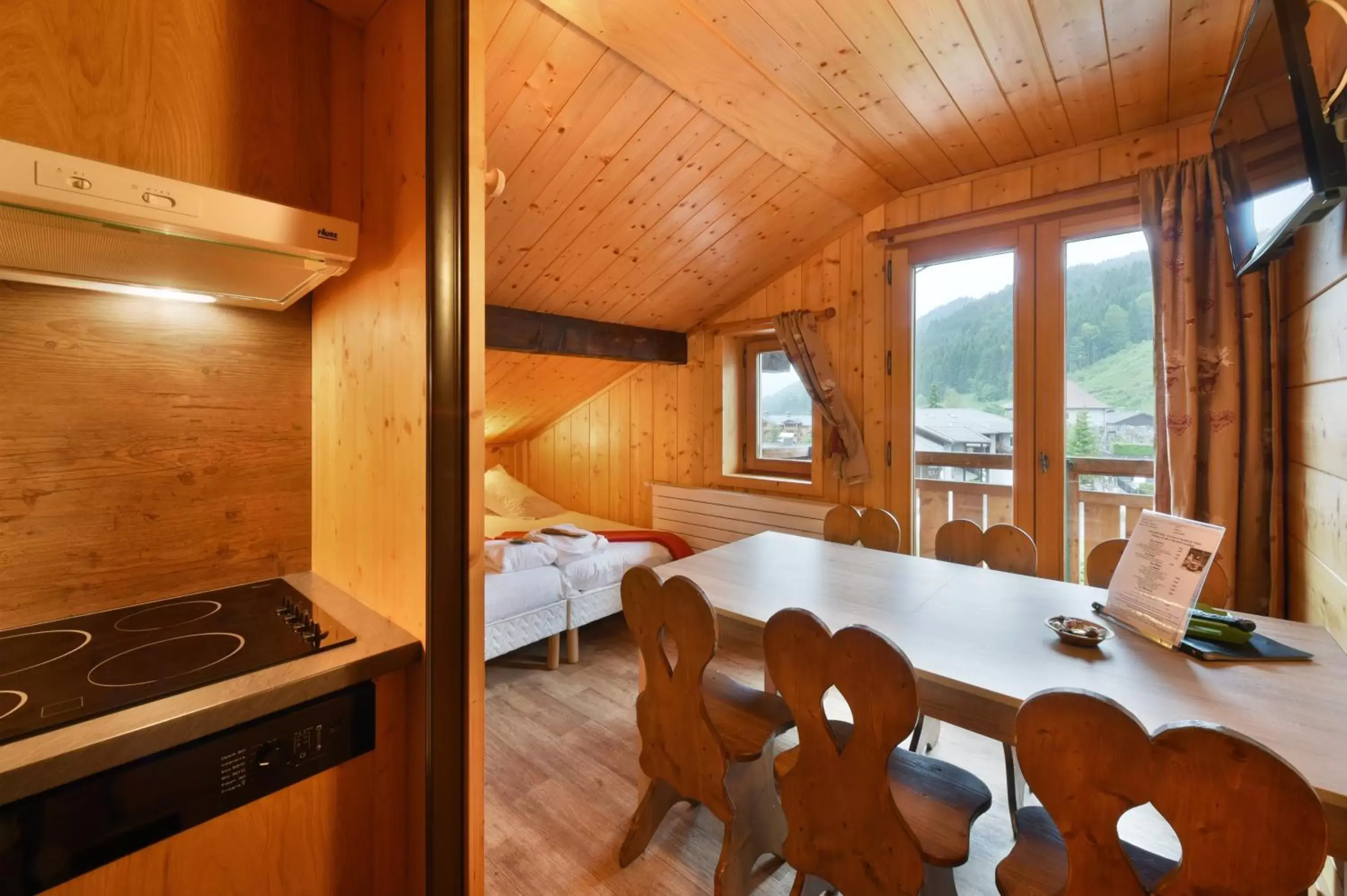 Kitchen or kitchenette in Loc'Hotel Alpen Sports