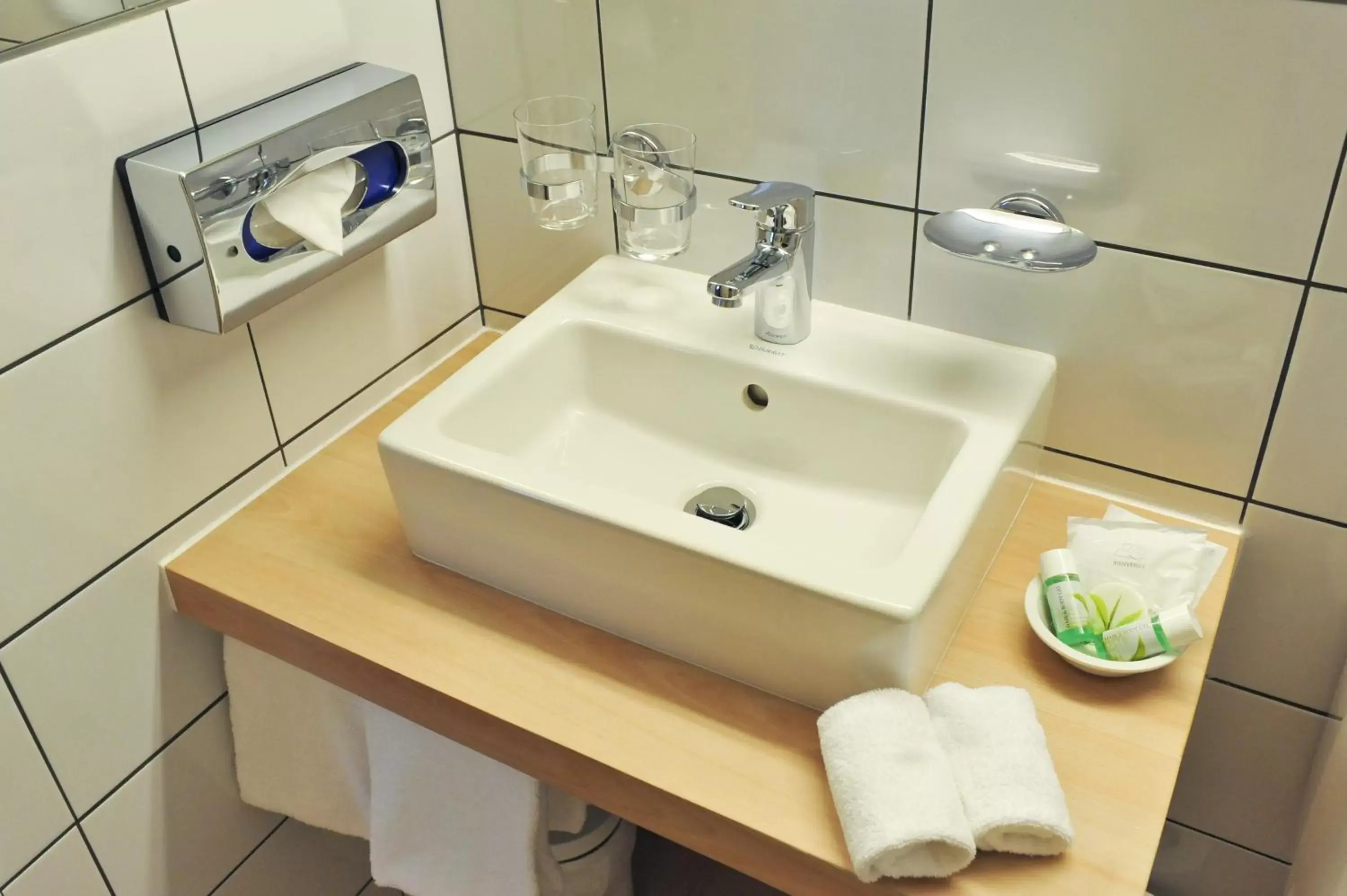 Bathroom in Hotel des Alpes