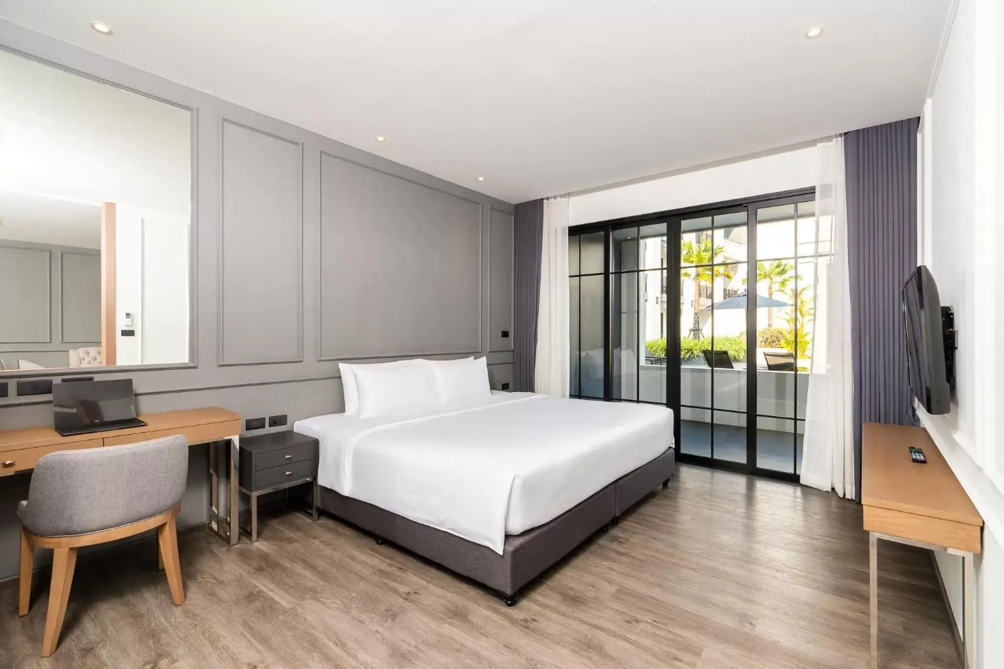 Bedroom in One Patio Hotel Pattaya - SHA Extra Plus