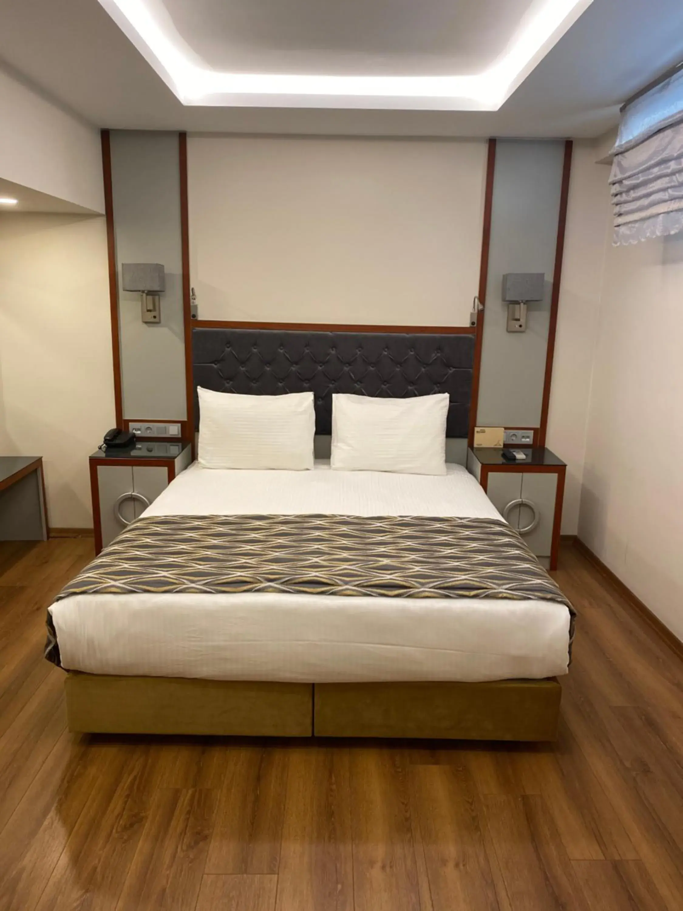 Bed in Muyan Suites