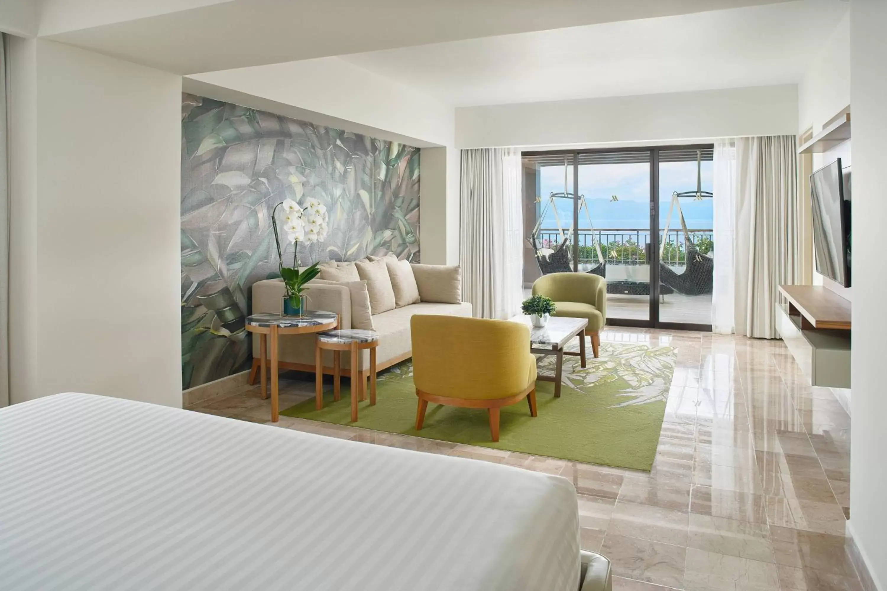 Photo of the whole room, Seating Area in Marriott Puerto Vallarta Resort & Spa