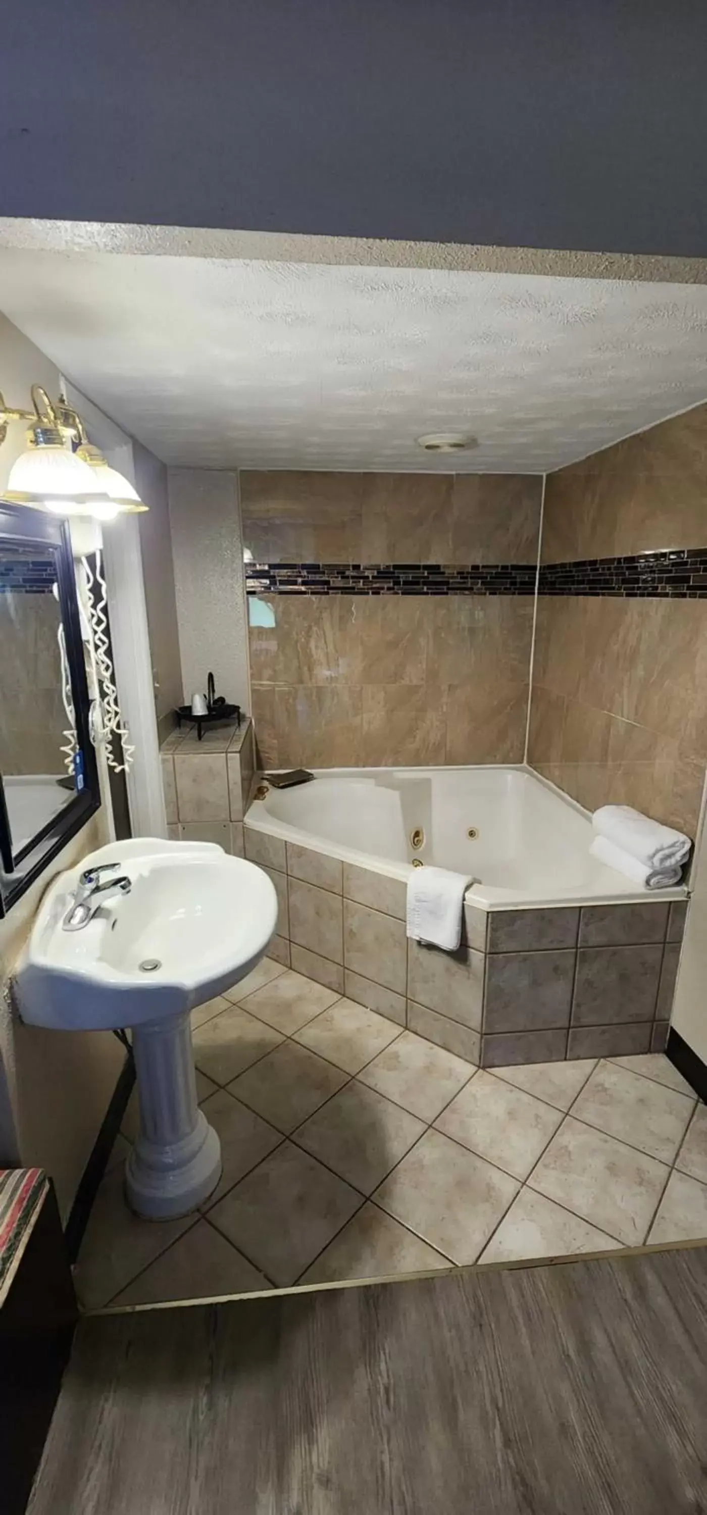Bathroom in Days Inn by Wyndham Fort Wright Cincinnati Area