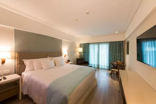 Bed in Vogal Luxury Beach Hotel & SPA