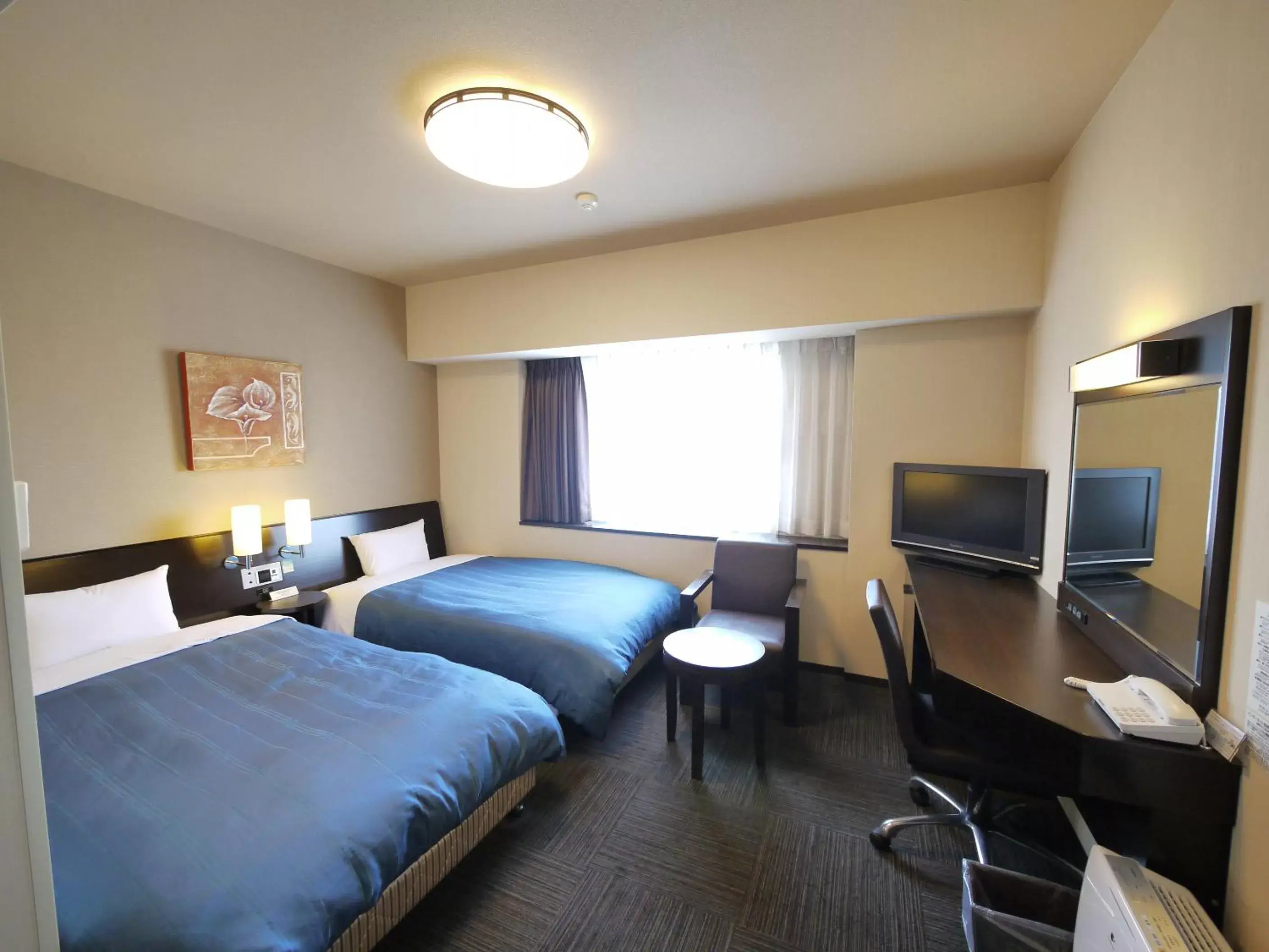 Photo of the whole room, Bed in Hotel Route-Inn Hikone