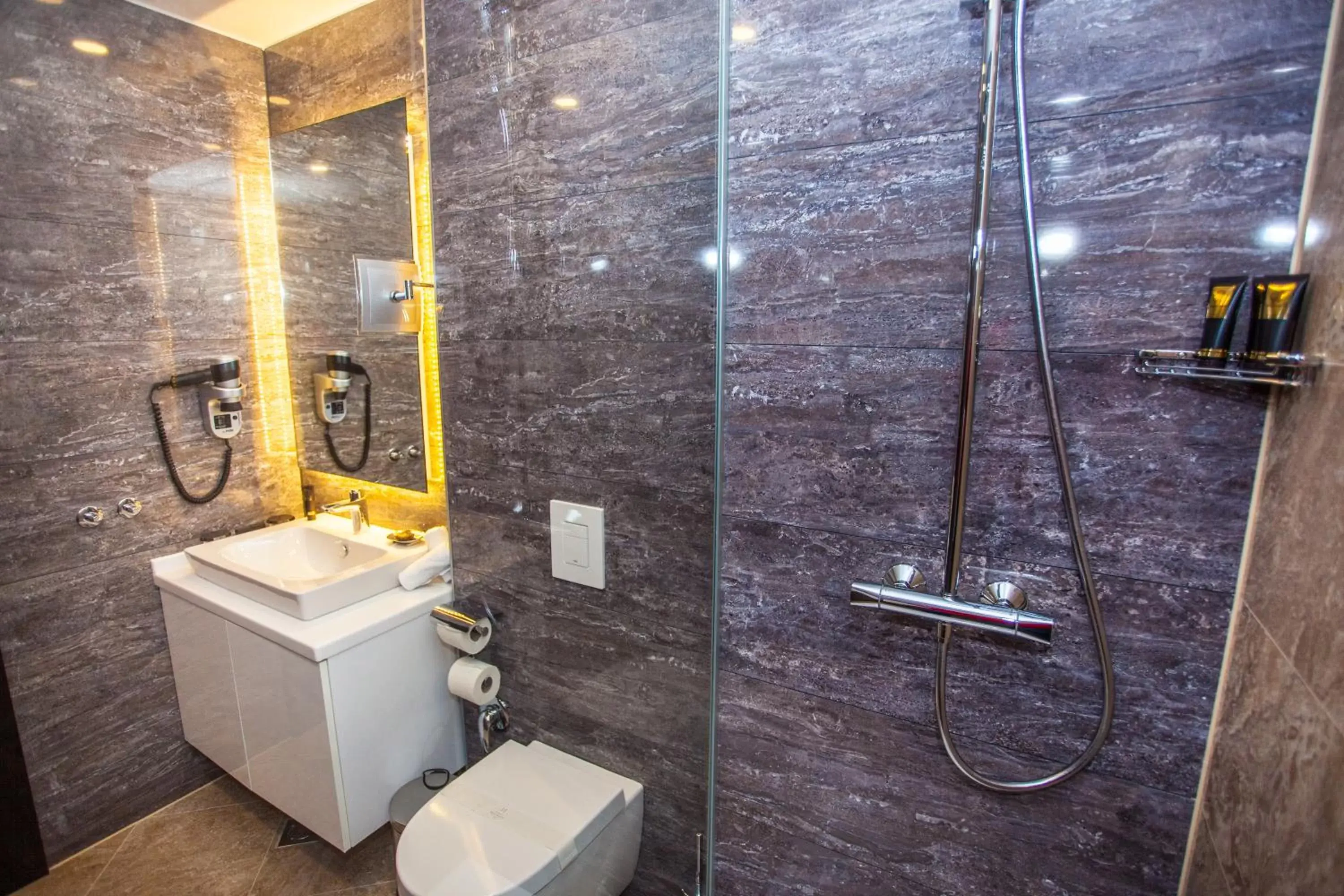 Bathroom in Malak Regency Hotel Bathroom in Malak Regency Hotel