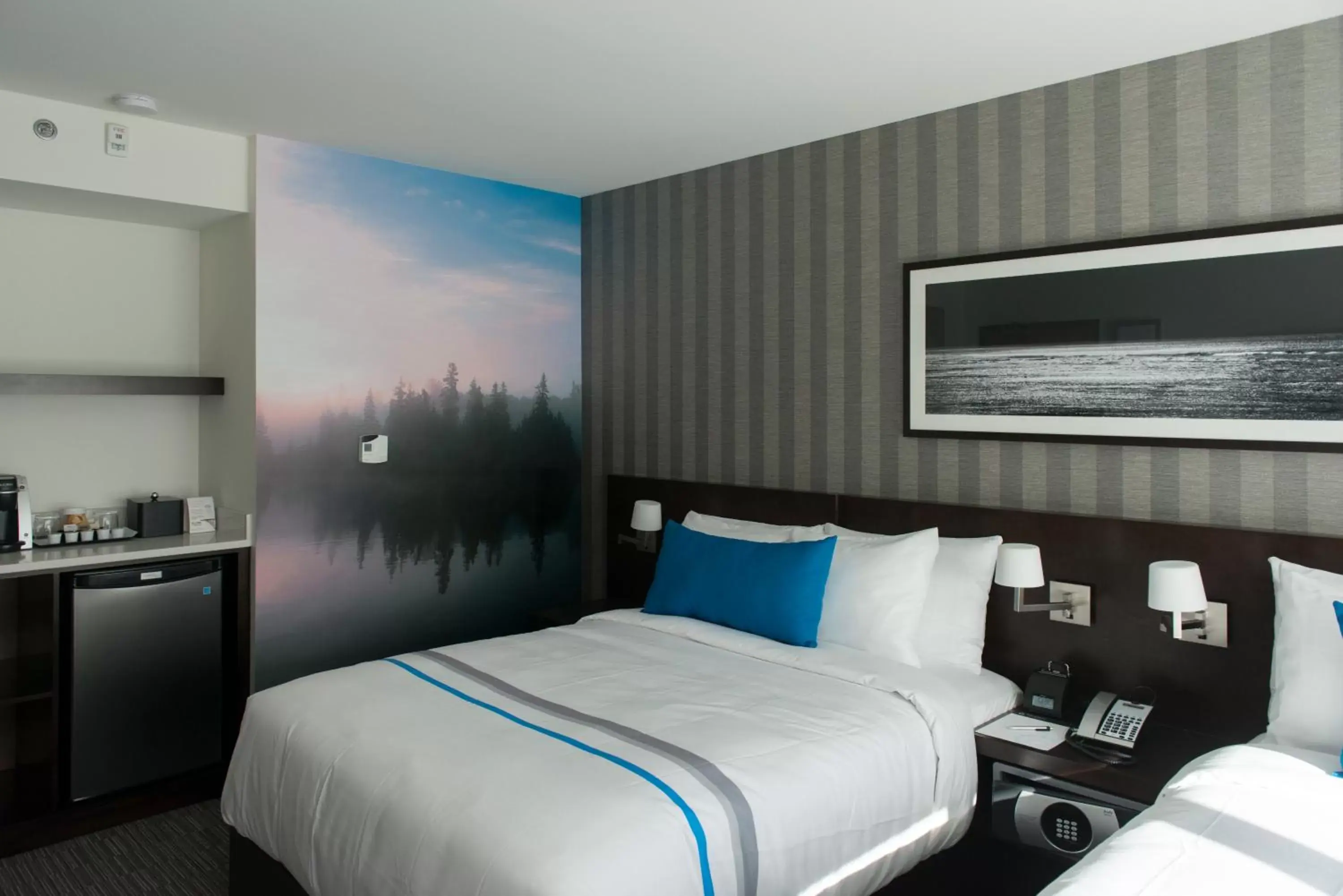 Bed in The Grand Winnipeg Airport Hotel by Lakeview