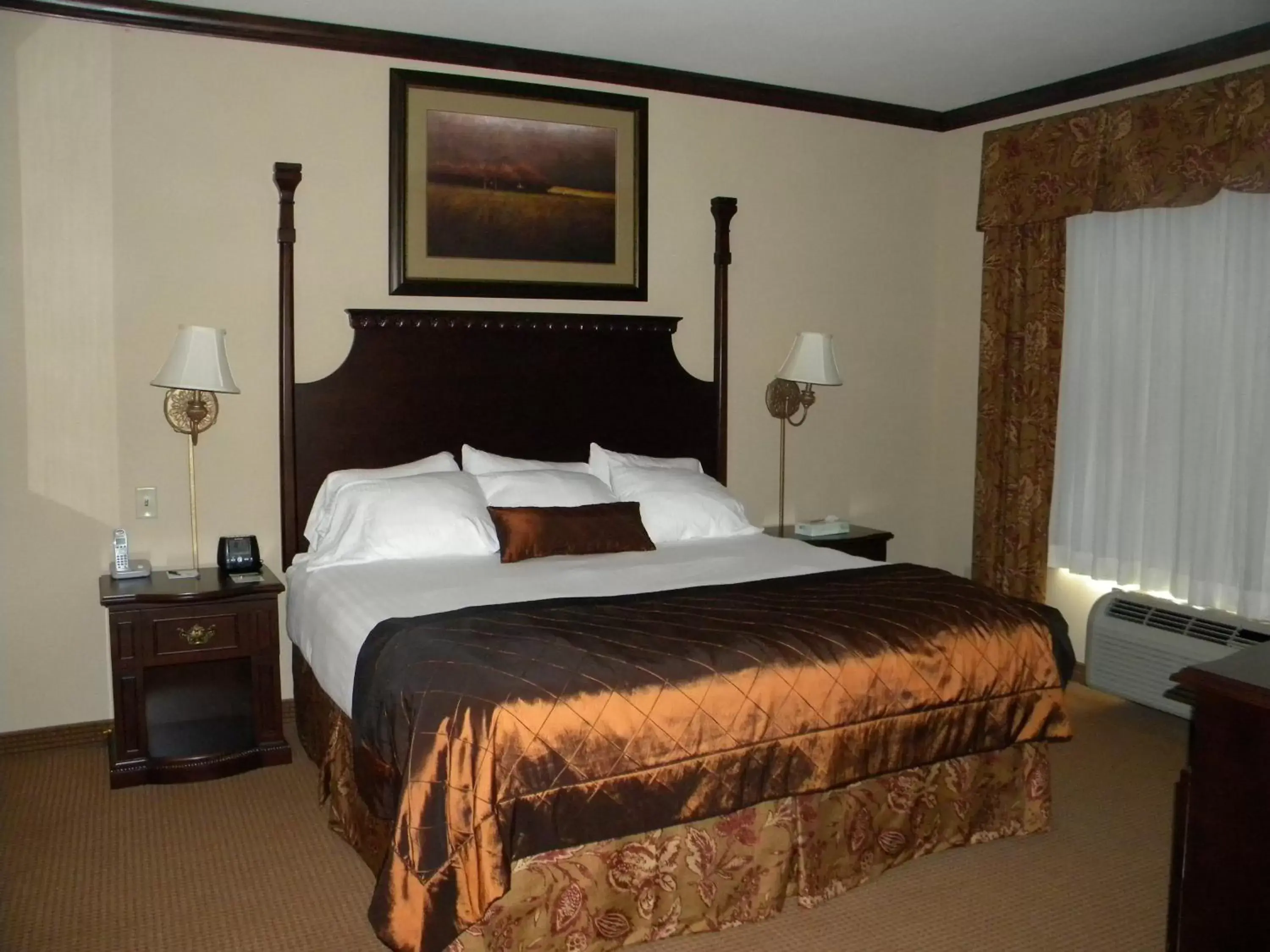 Bed in Big Country Hotel & Suites