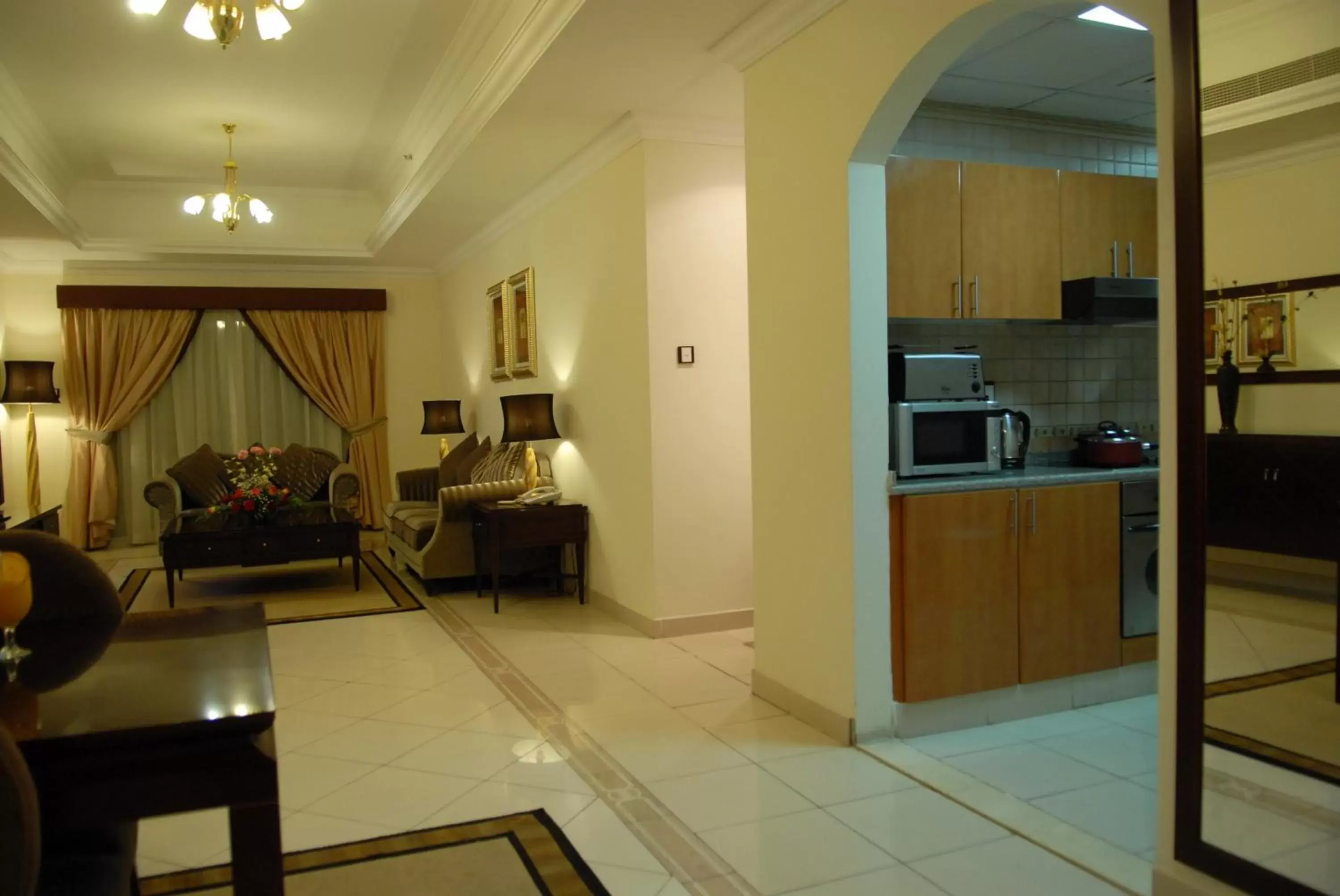 Living room, Kitchen/Kitchenette in Al Manar Hotel Apartments