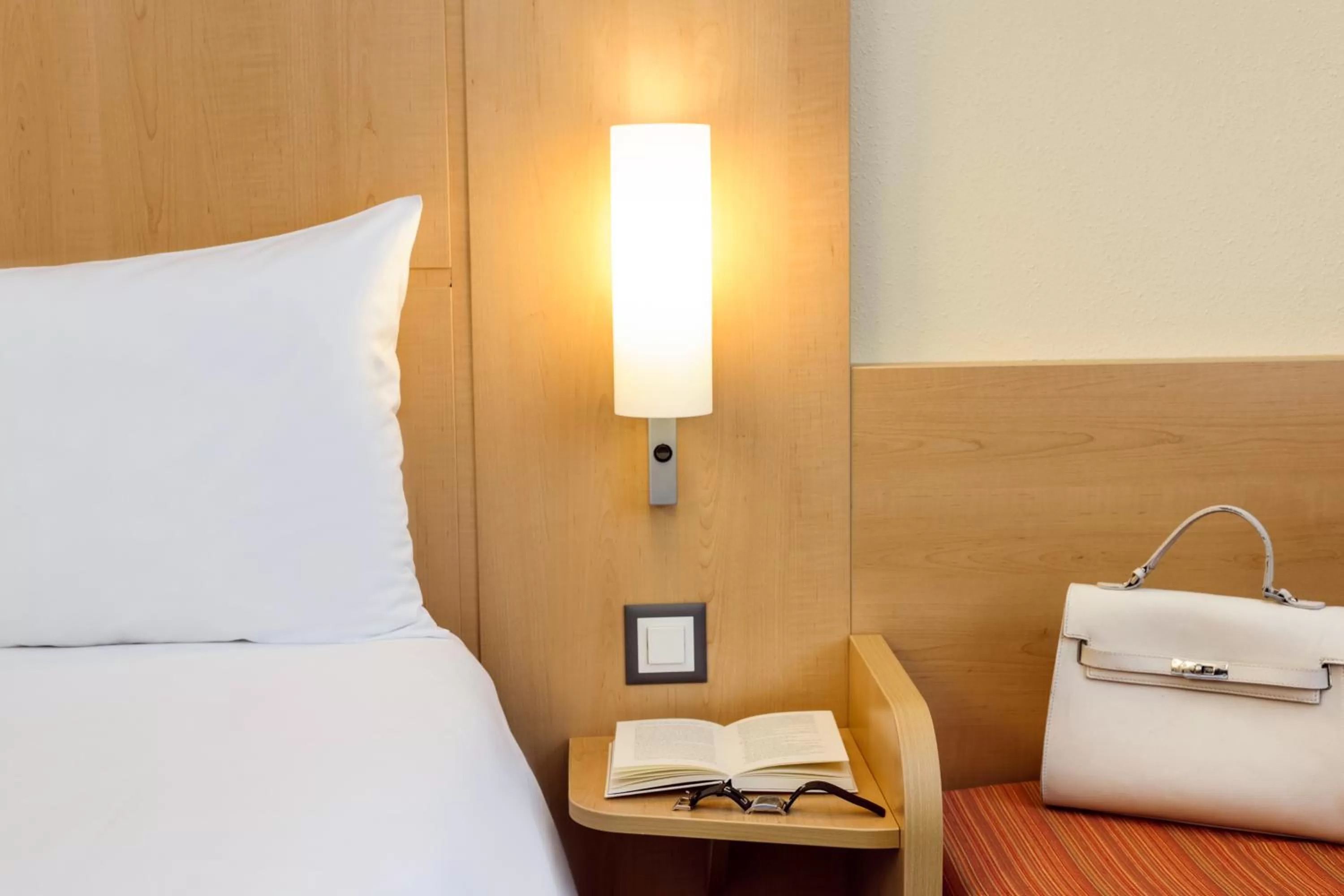 Bed in Ibis Lugano Paradiso