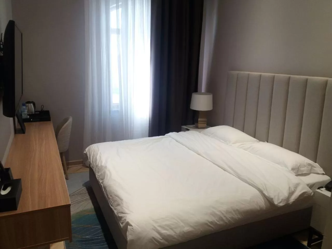 Bed in Termez Palace Hotel & Spa