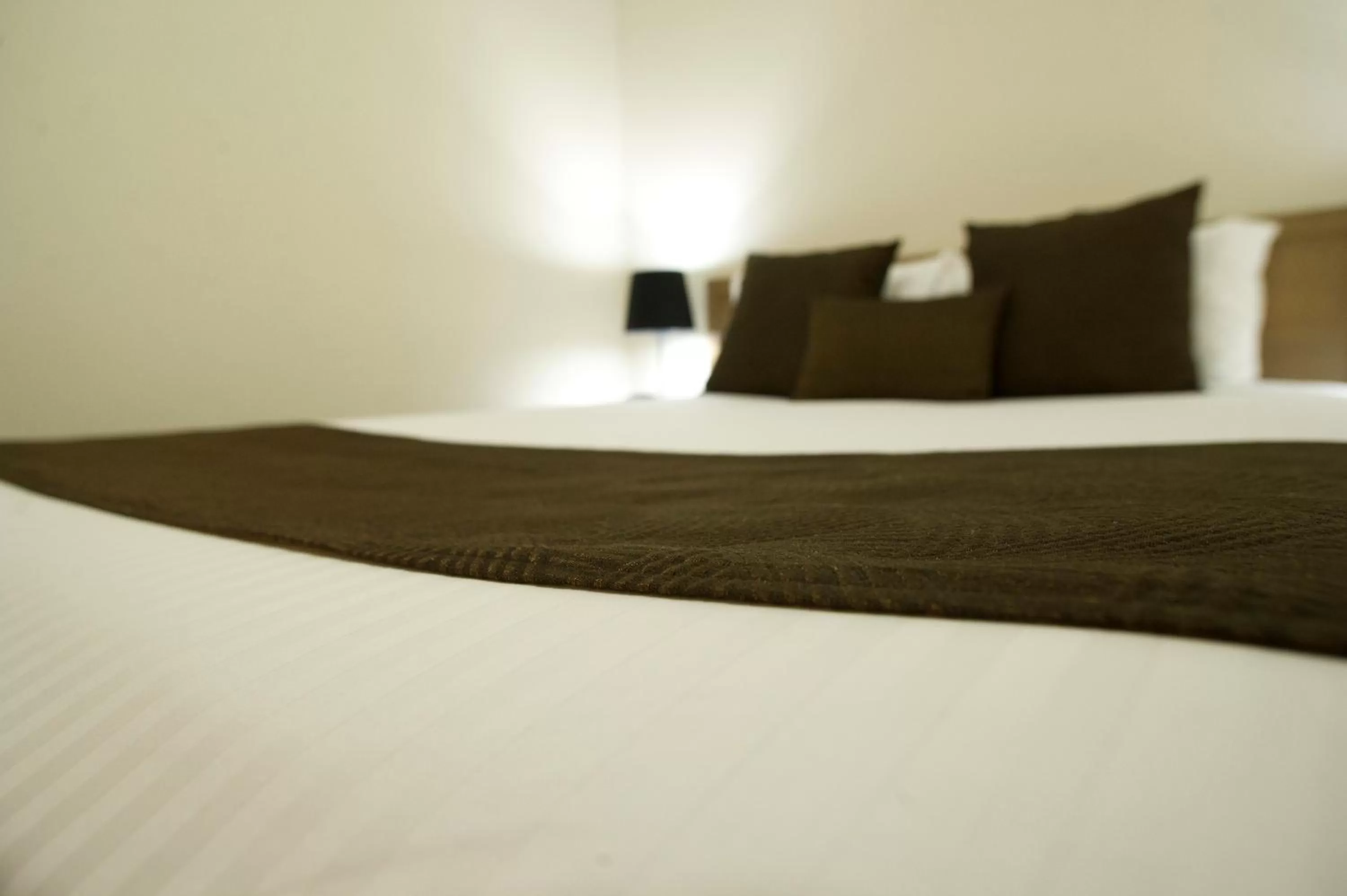 Bed in Noah's Mid City Motor Inn Muswellbrook