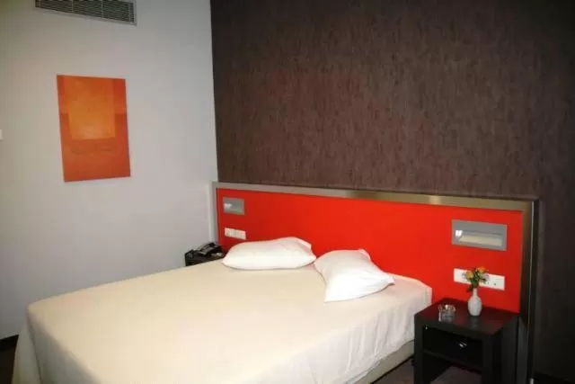 Bed in Hotel Des Roses