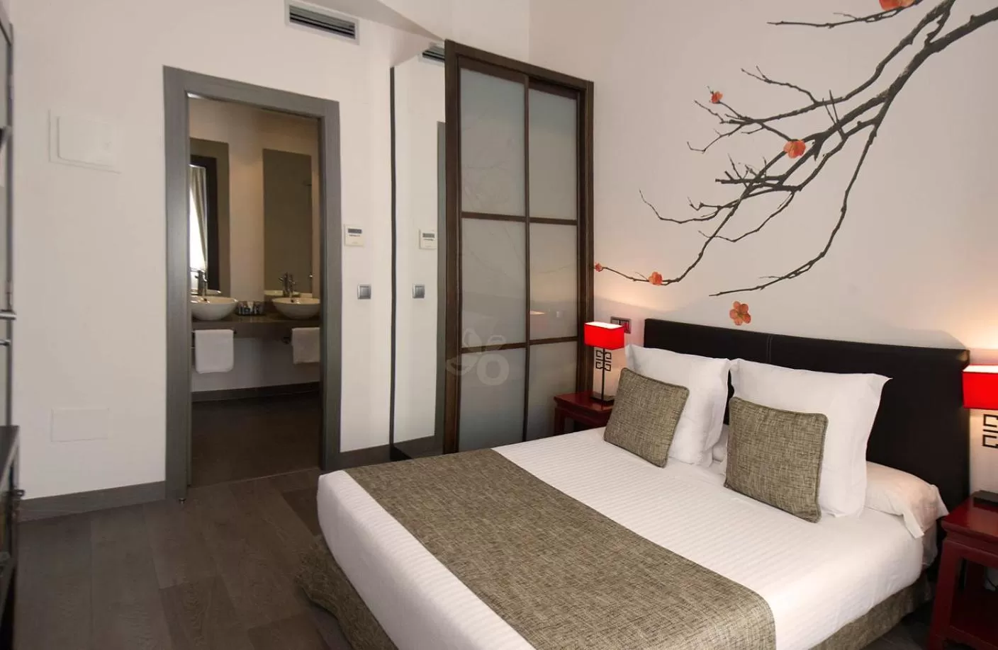 Bed in Le Petit Boutique Hotel