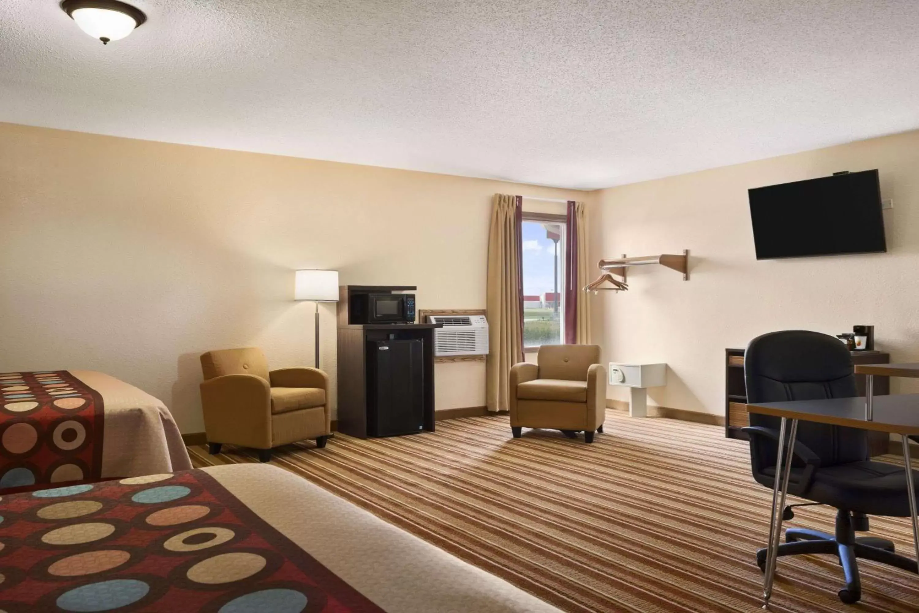 Photo of the whole room, TV/Entertainment Center in Super 8 by Wyndham Mattoon