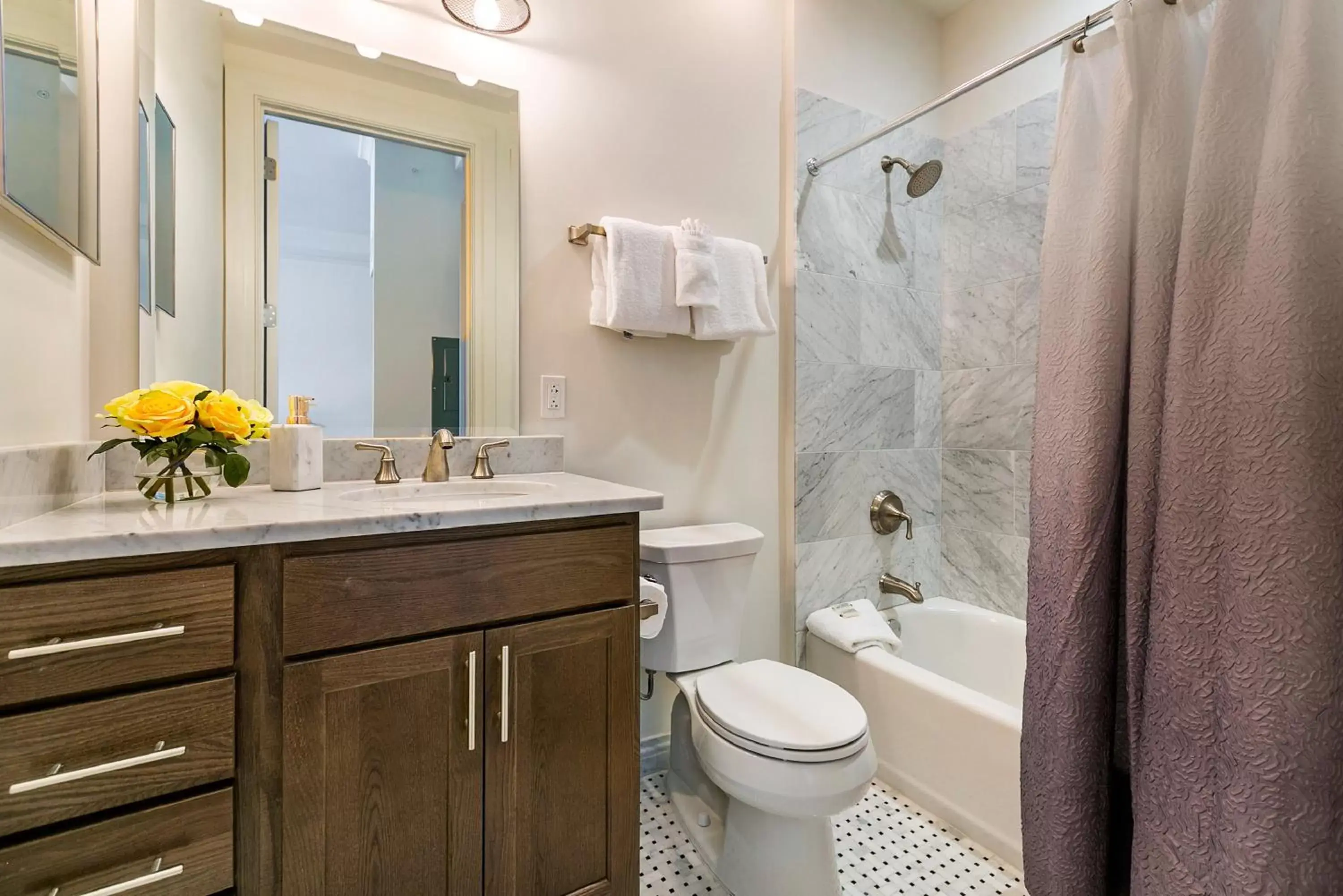 Bathroom in 1 and 2 BR Private Condos Steps Away From French Quarter