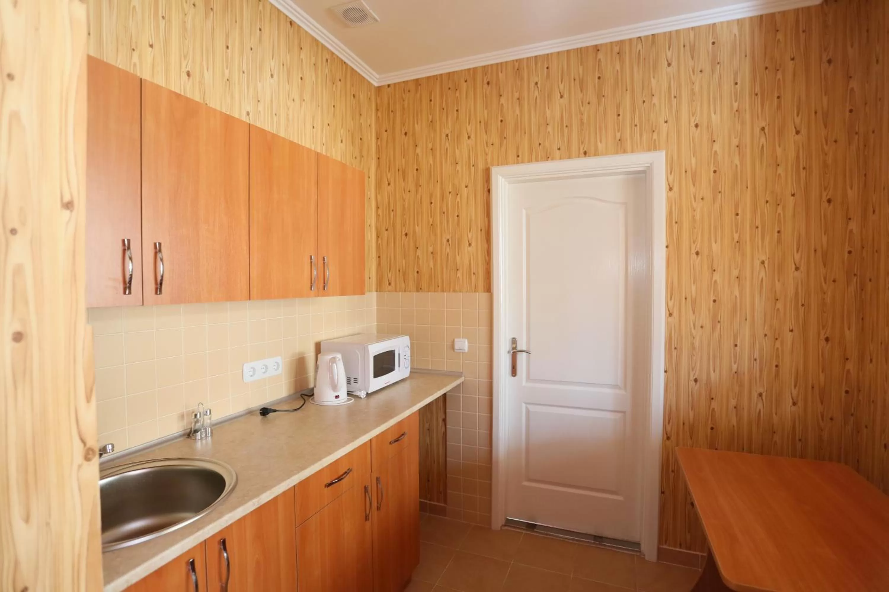 Coffee/tea facilities, Kitchen/Kitchenette in Praktik Hotel & Restaurant