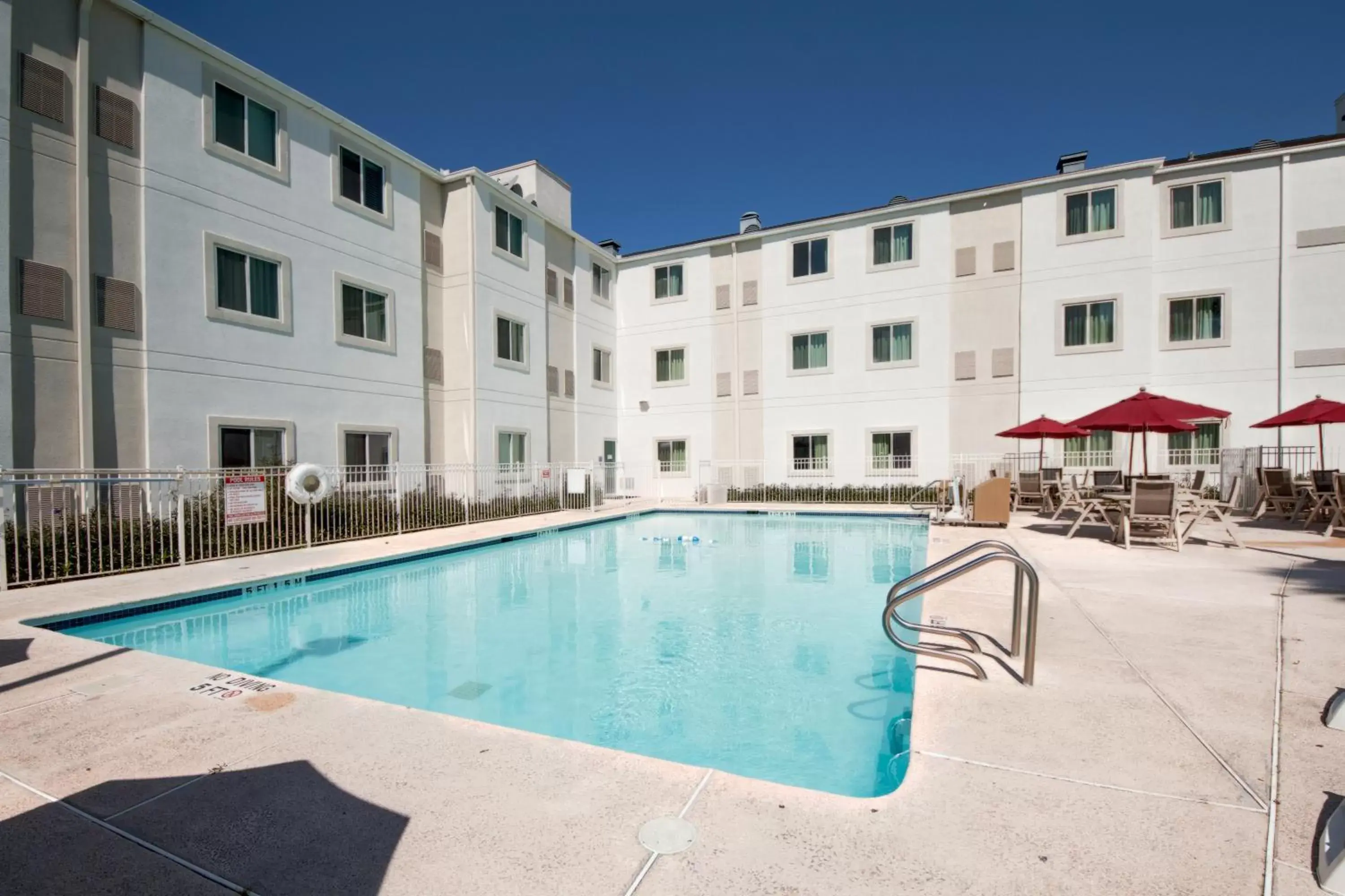 Property building, Swimming Pool in Motel 6-Brownsville, TX