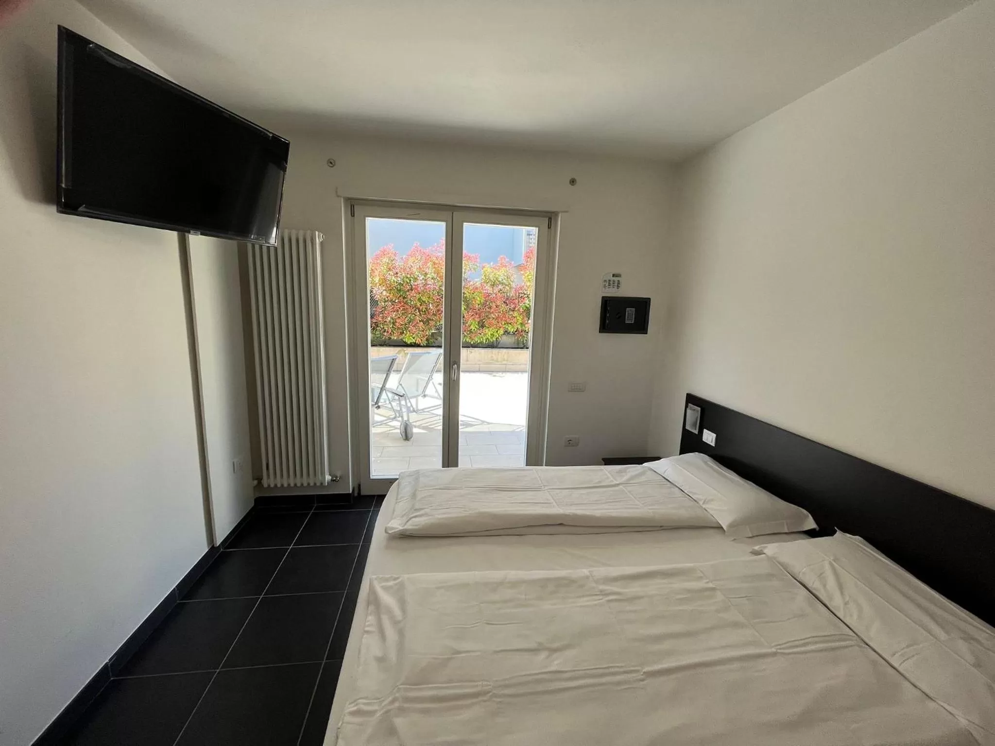 Bed in 4 Limoni Apartment Resort