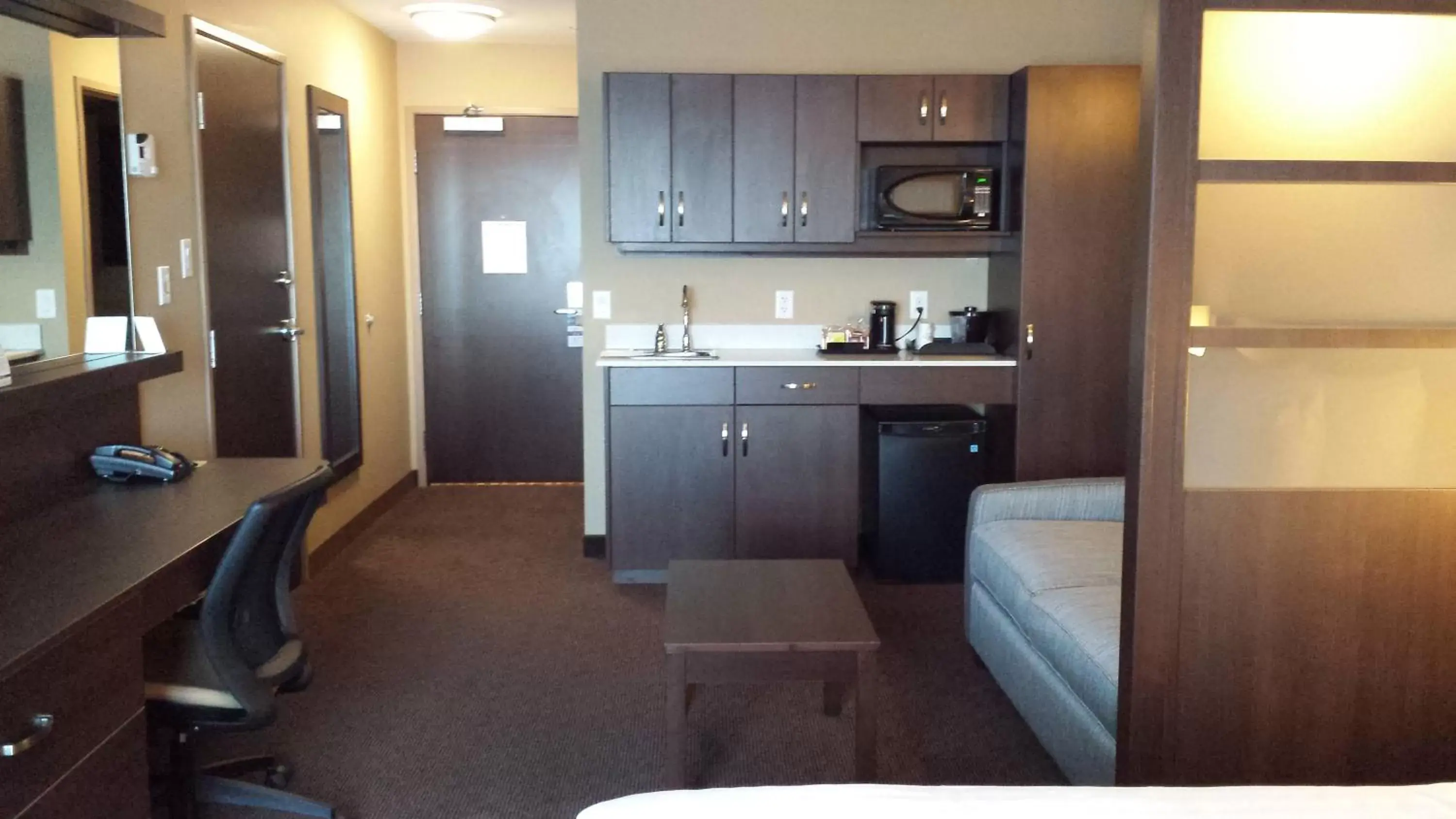 Kitchen or kitchenette, Kitchen/Kitchenette in Microtel Inn & Suites by Wyndham Red Deer