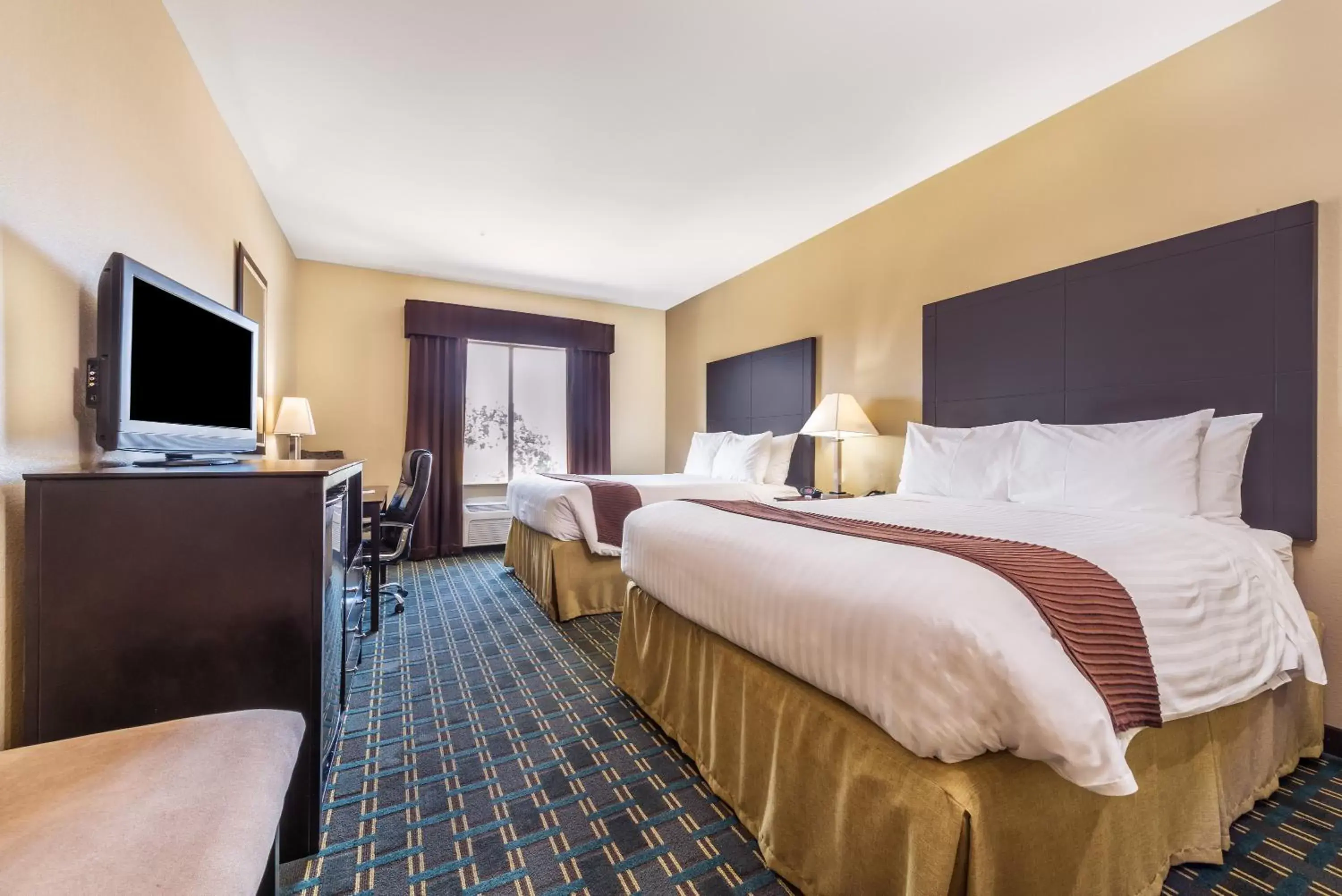 Bed in Days Inn & Suites by Wyndham Mineral Wells Bed in Days Inn & Suites by Wyndham Mineral Wells