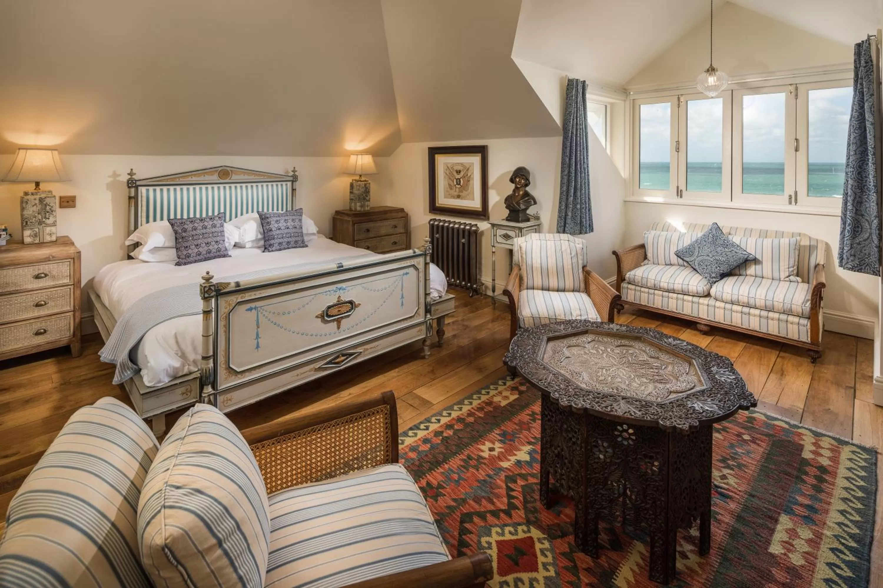 Photo of the whole room, Bed in Tolcarne Beach Colonial Restaurant and Rooms