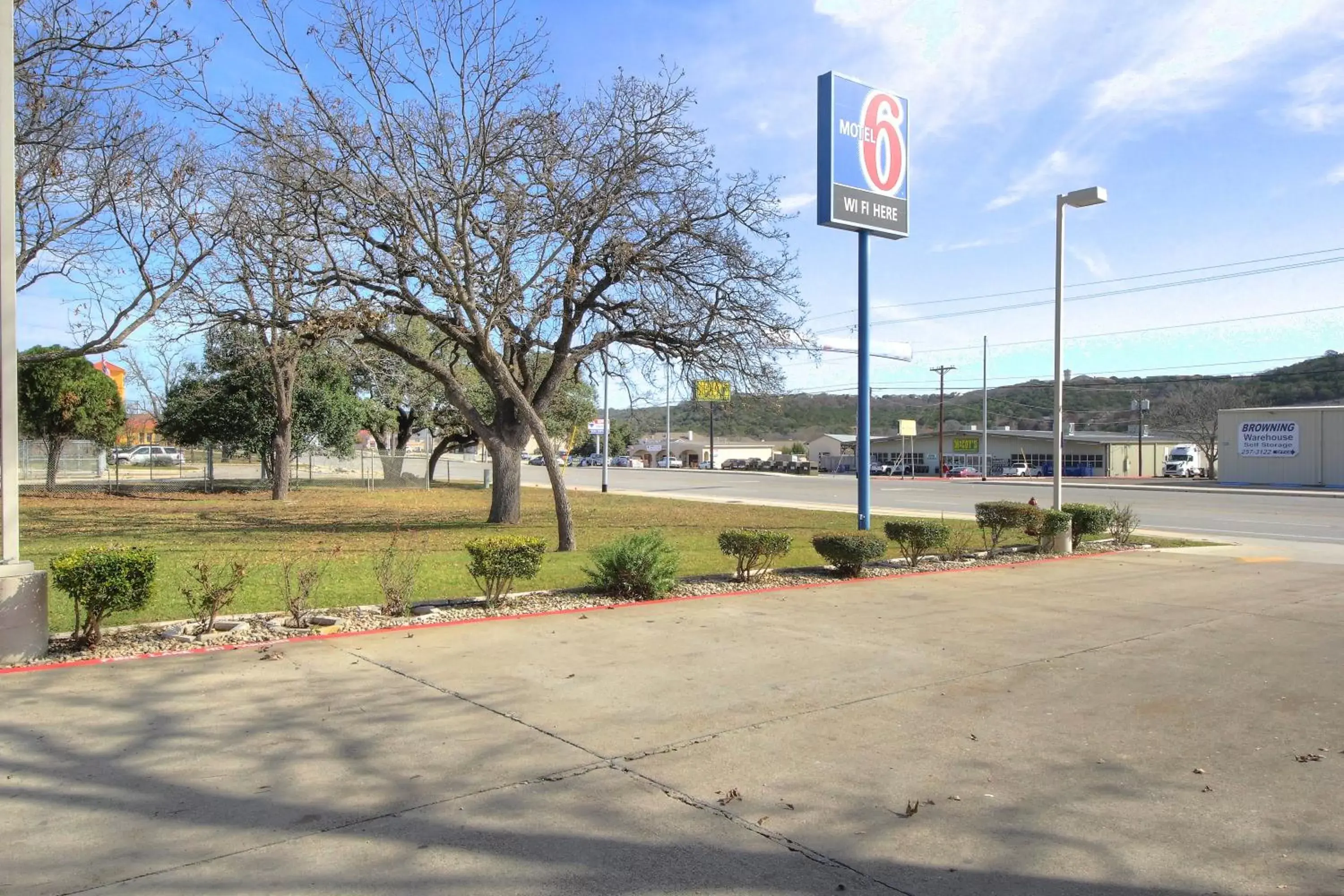 Property logo or sign in Motel 6-Kerrville, TX