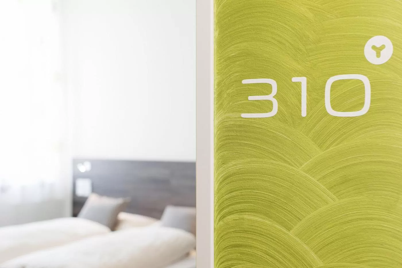 Decorative detail, Bed in eee Hotel Traun