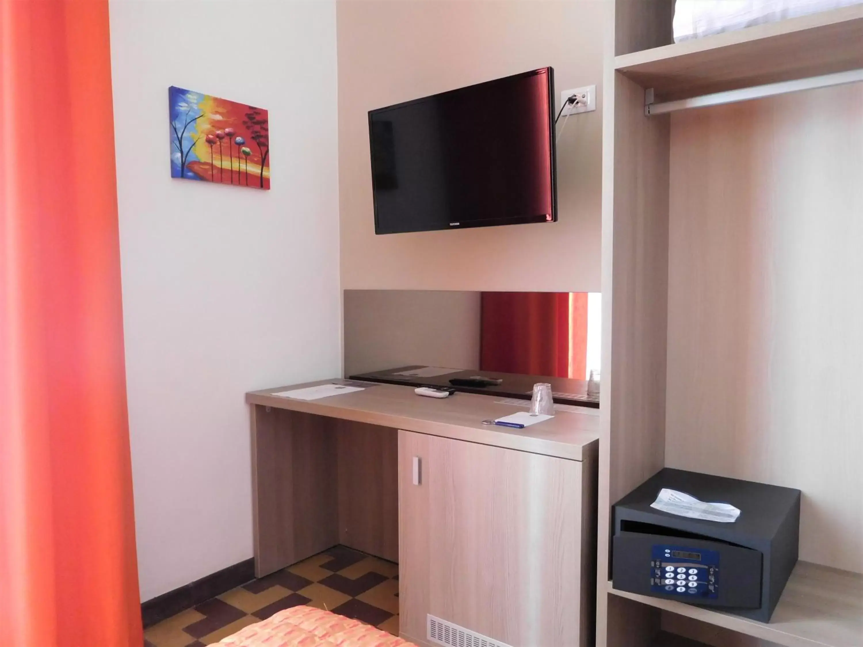 TV and multimedia, TV/Entertainment Center in Moonlight Hotel&Suites