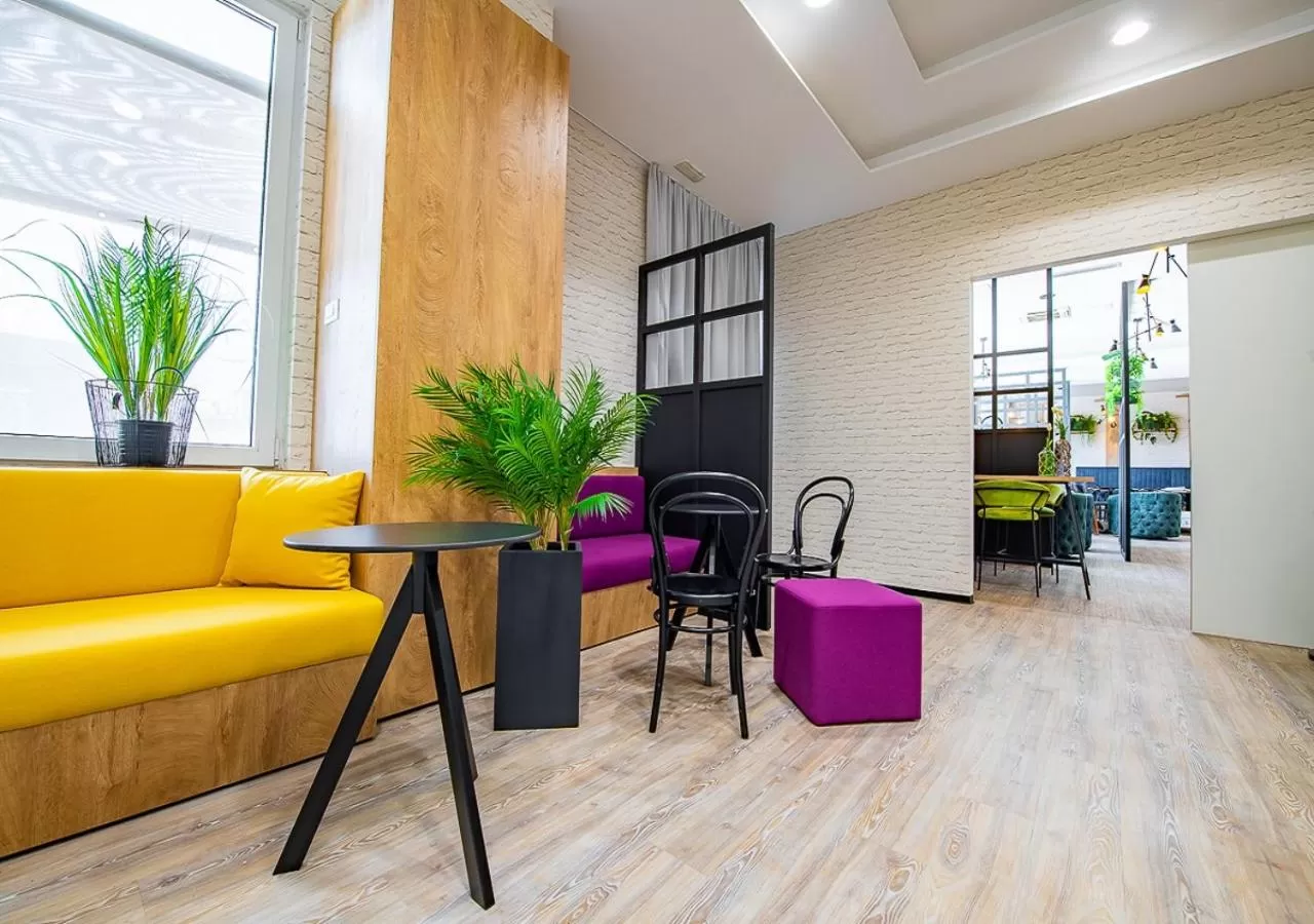 Communal lounge/ TV room in Urban Ring Hotel