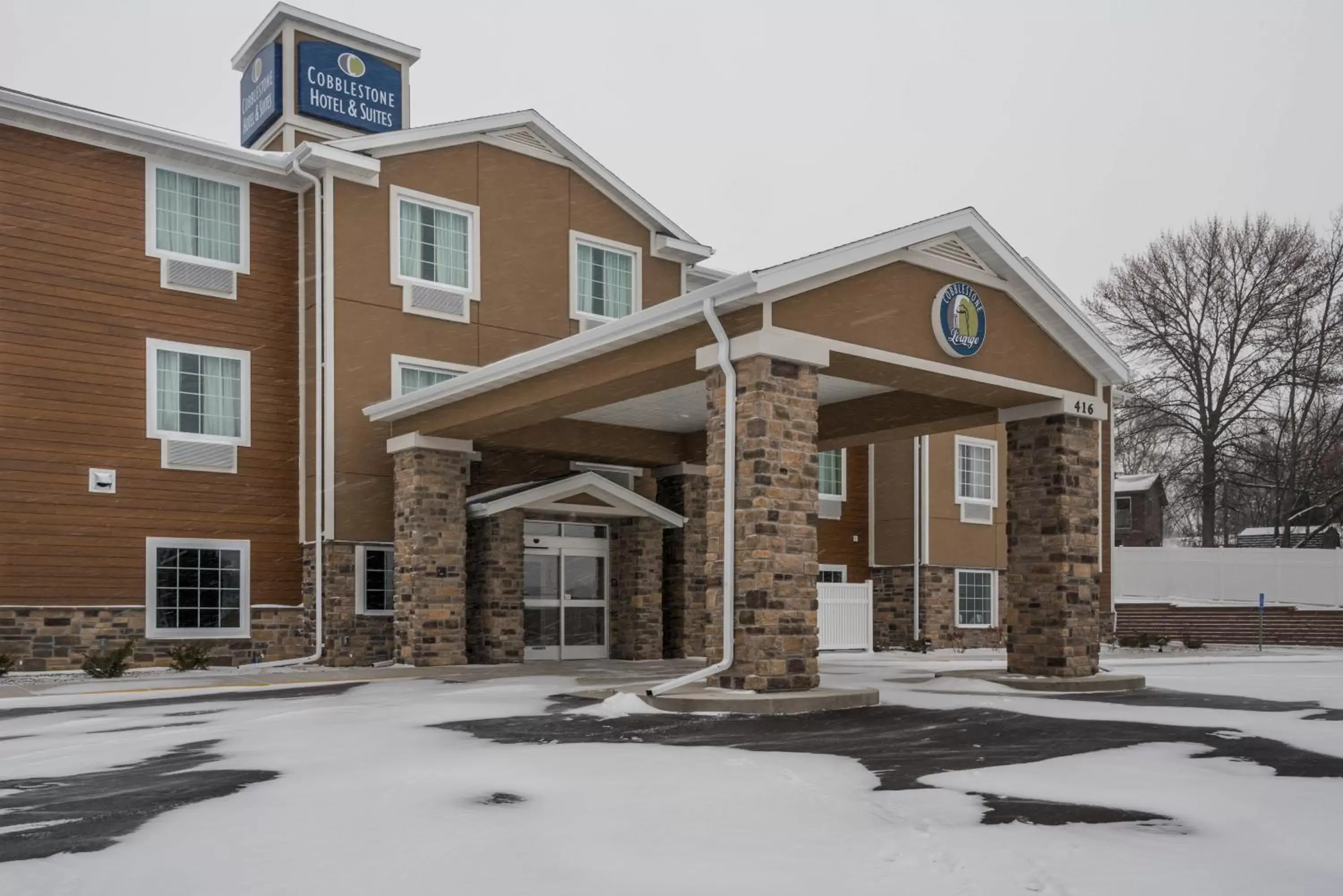 Property building, Winter in Cobblestone Hotel & Suites - Hutchinson