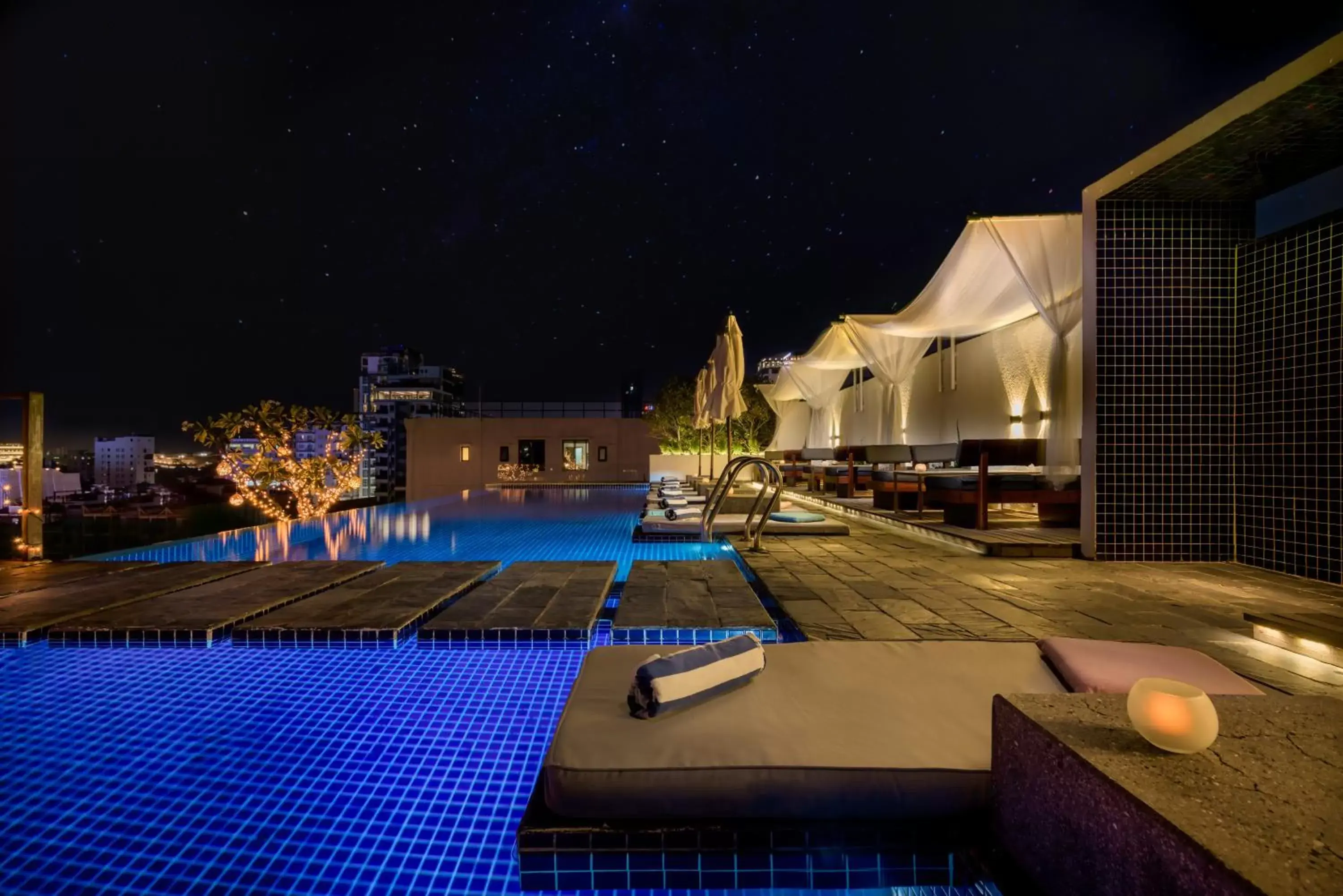 Seating area, Swimming Pool in PATIO Hotel & Urban Resort