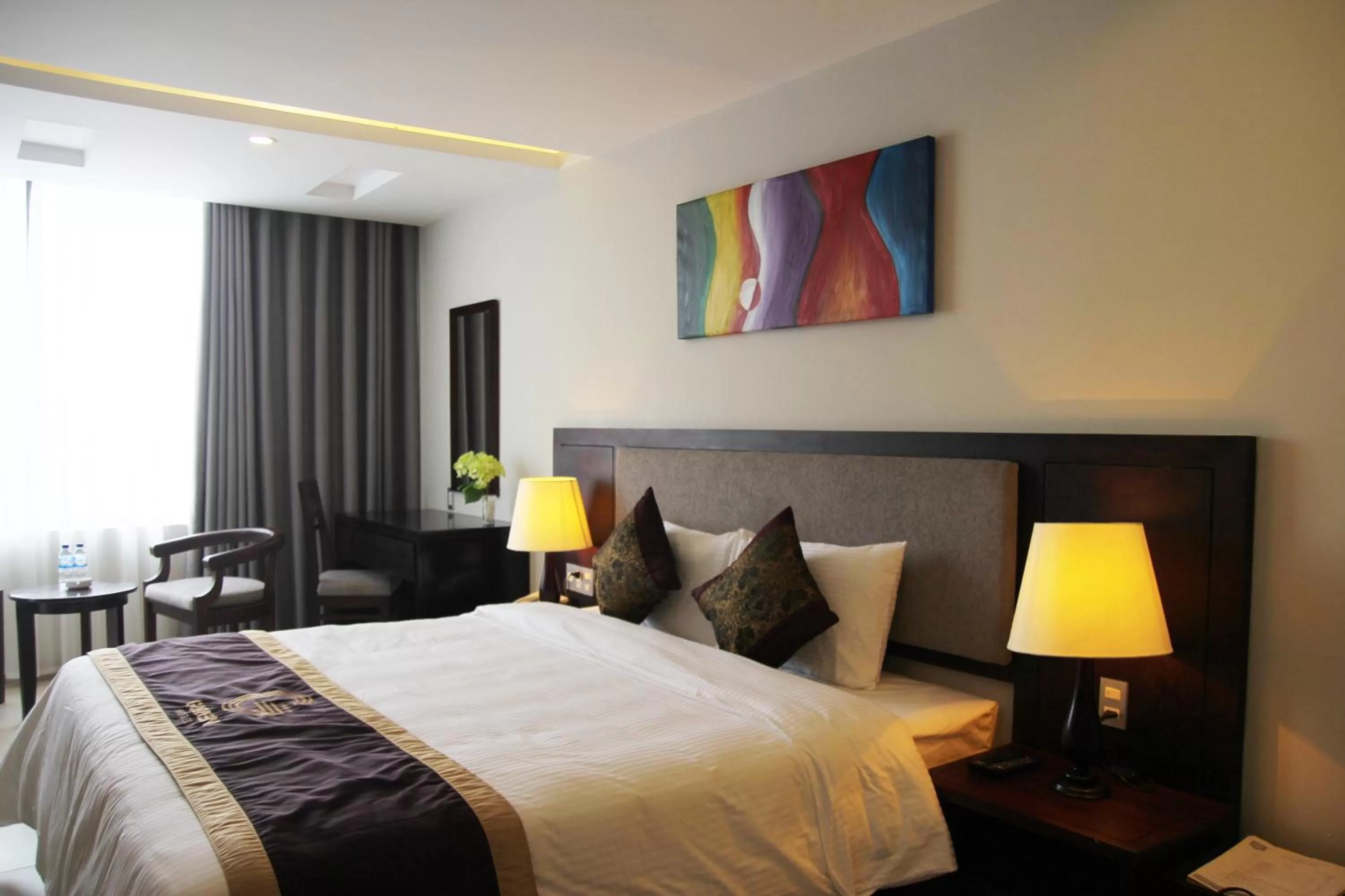 Bed in Golden Quang Tri Hotel