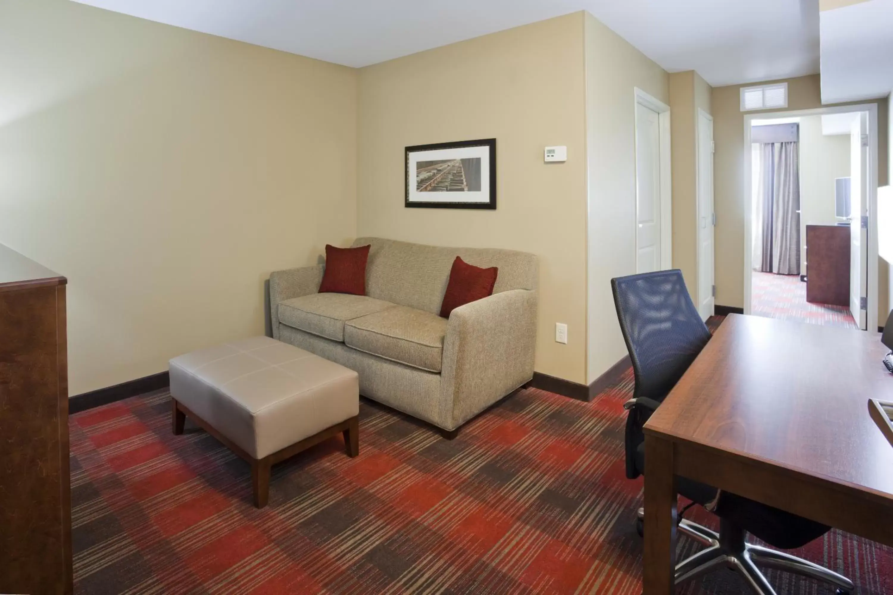 Photo of the whole room, Seating Area in GrandStay Hotel and Suites - Tea/Sioux Falls