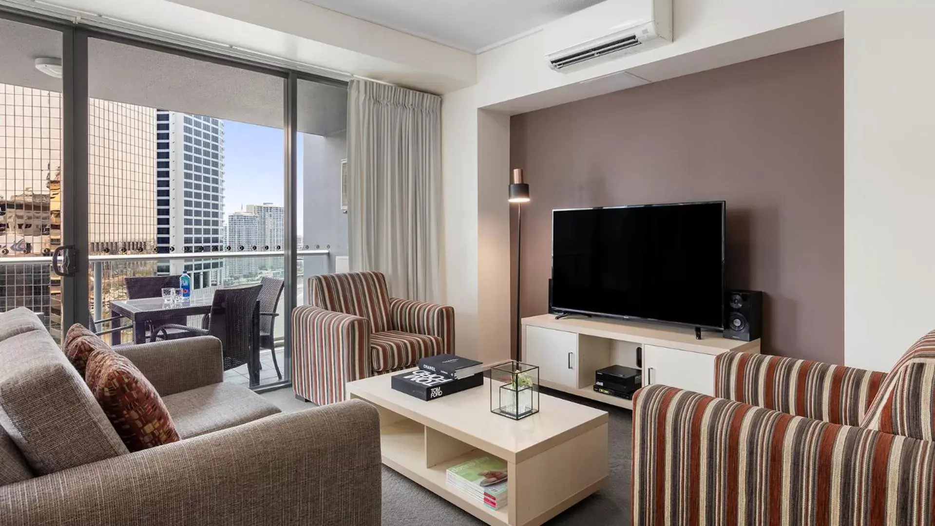 TV and multimedia, Seating Area in Oaks Brisbane on Felix Suites