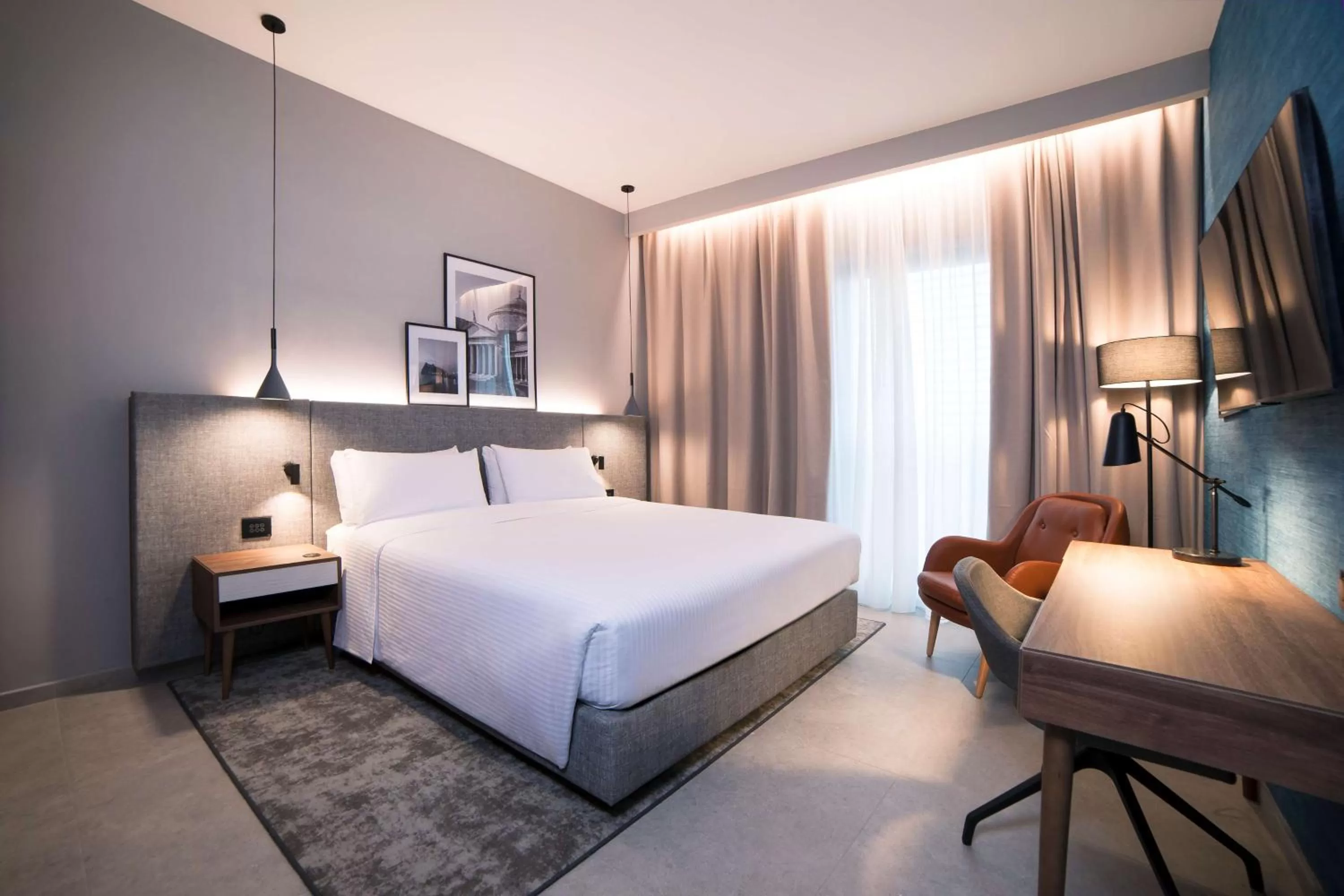 Photo of the whole room, Bed in Radisson Hotel Nola Naples