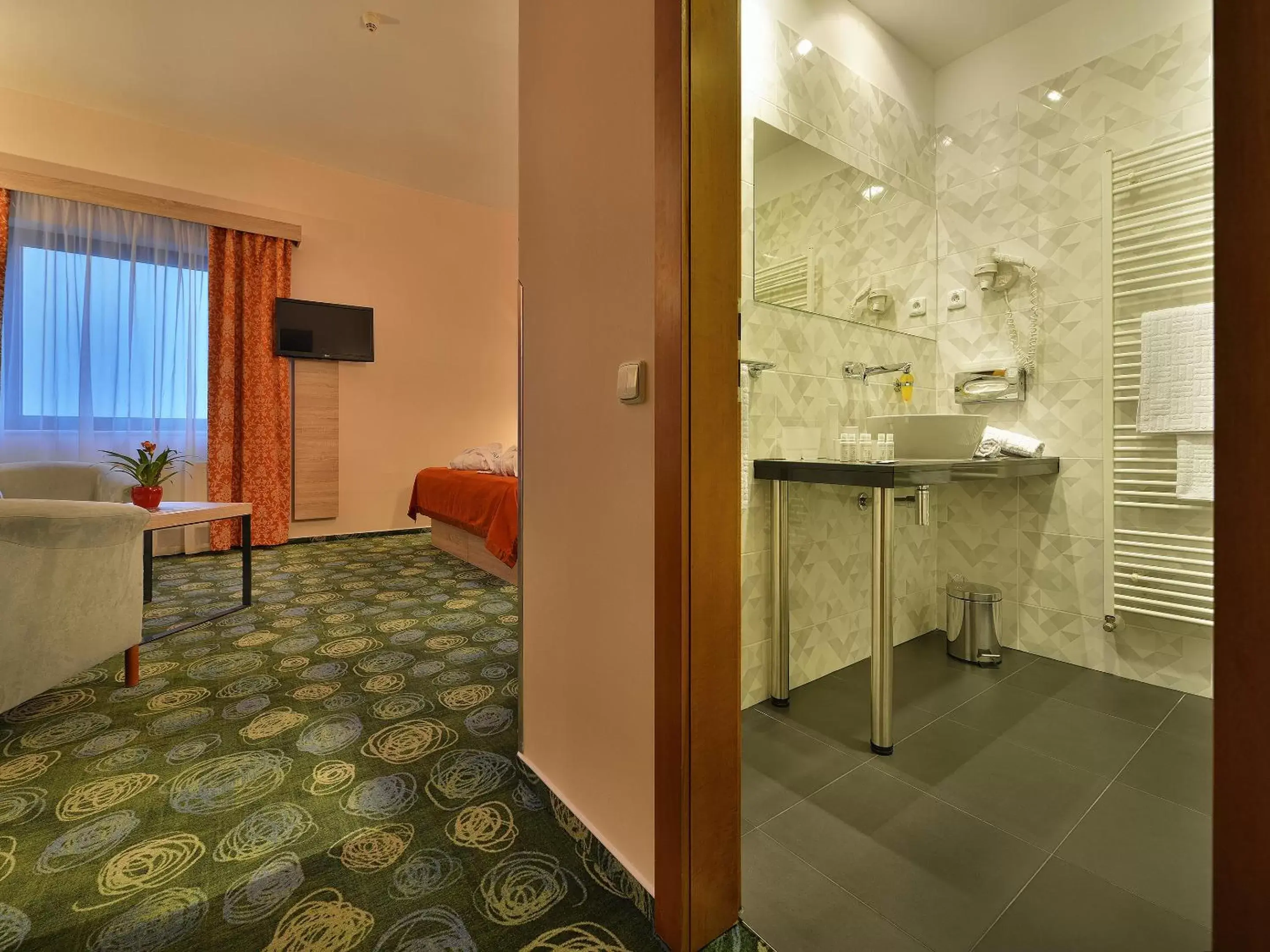 Photo of the whole room, Bathroom in Ramada Airport Hotel Prague