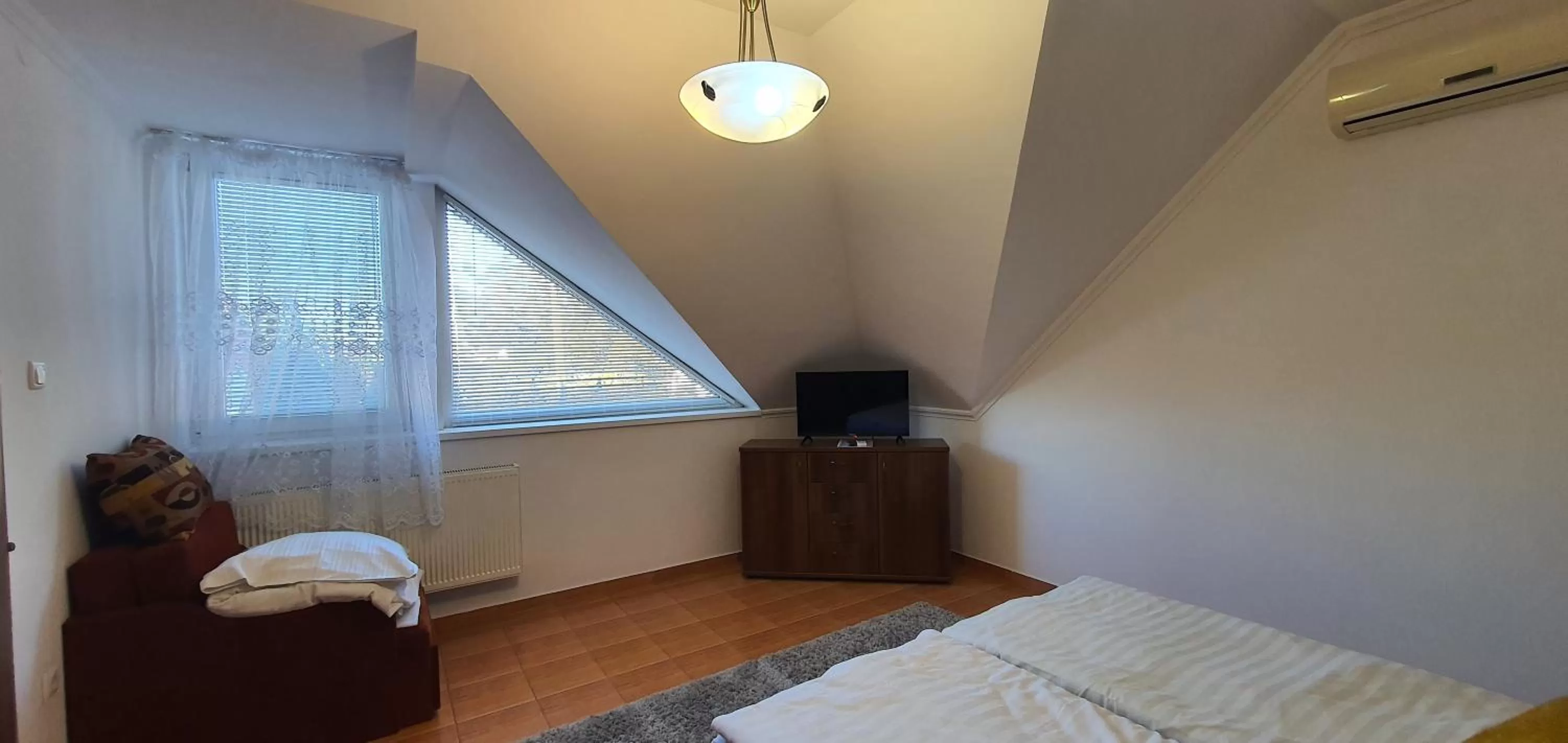 Bed in Aqua Oazis Apartman