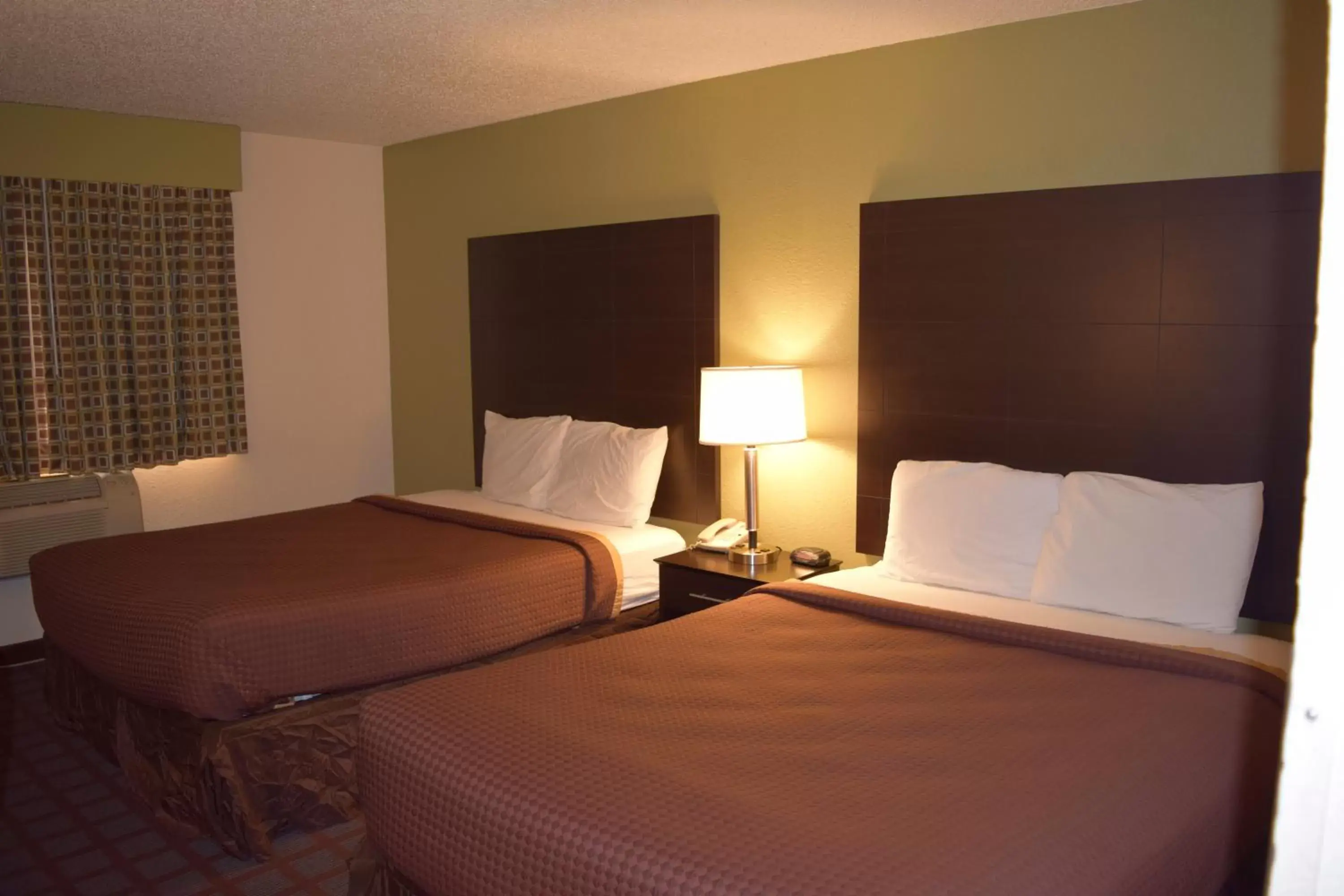 Bed in Super 8 by Wyndham Saginaw