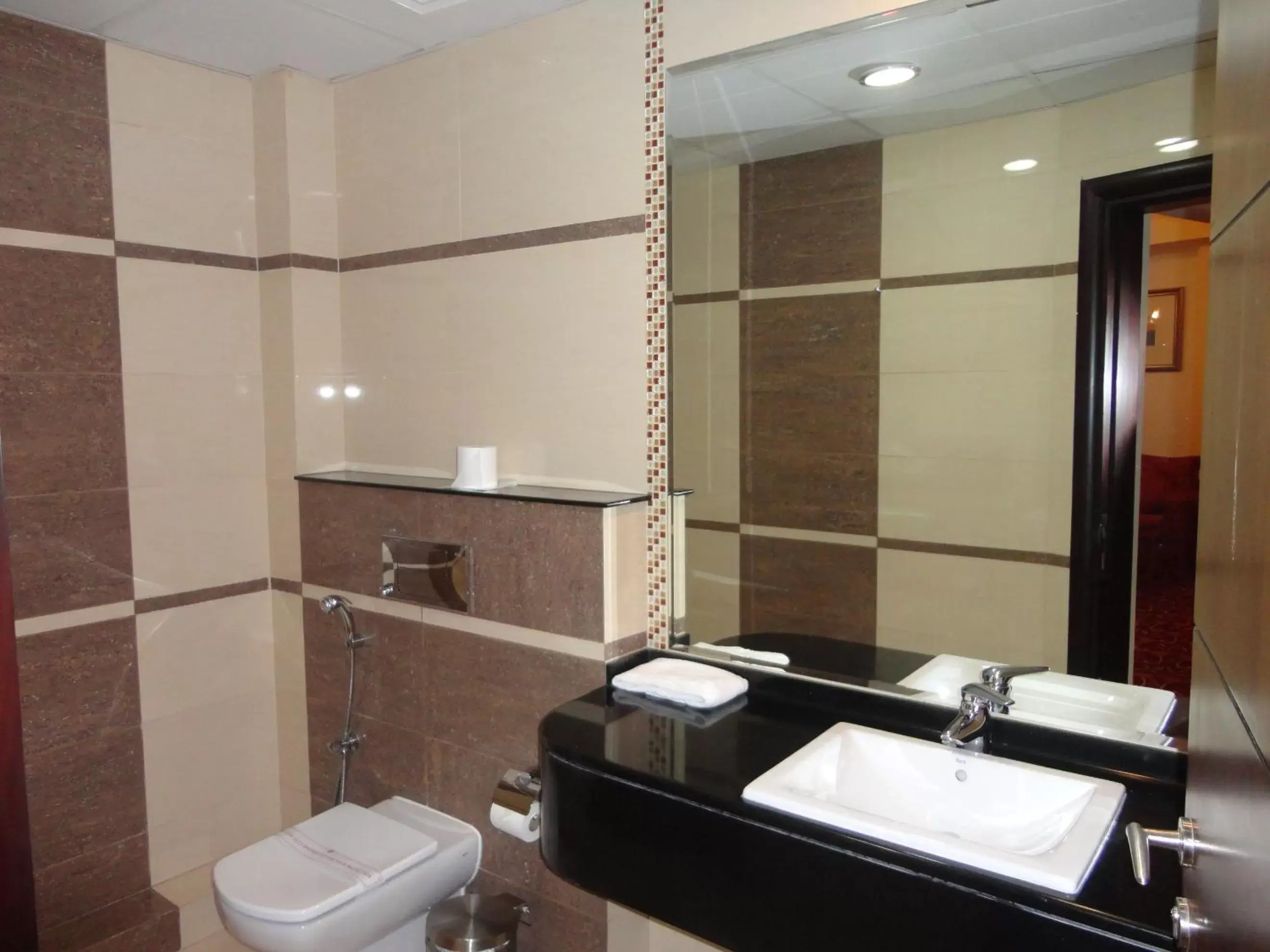 Bathroom in Ramee Rose Hotel