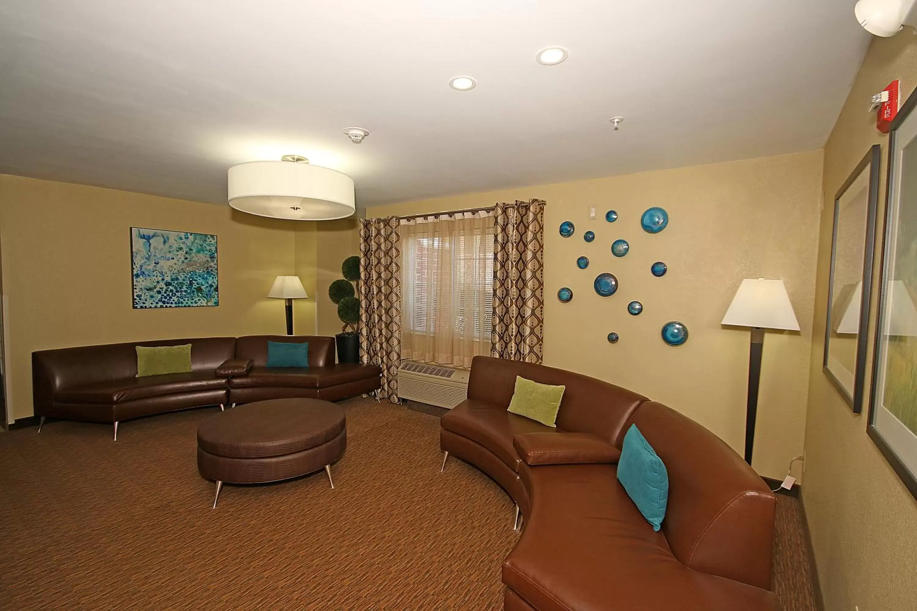 Property building, Seating Area in Candlewood Suites Newport News-Yorktown, an IHG Hotel
