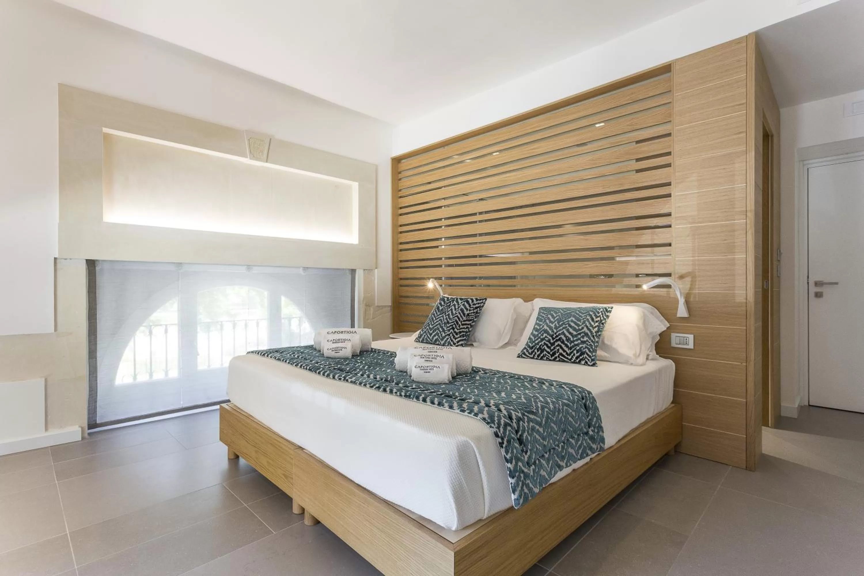 Photo of the whole room, Bed in Caportigia Boutique Hotel