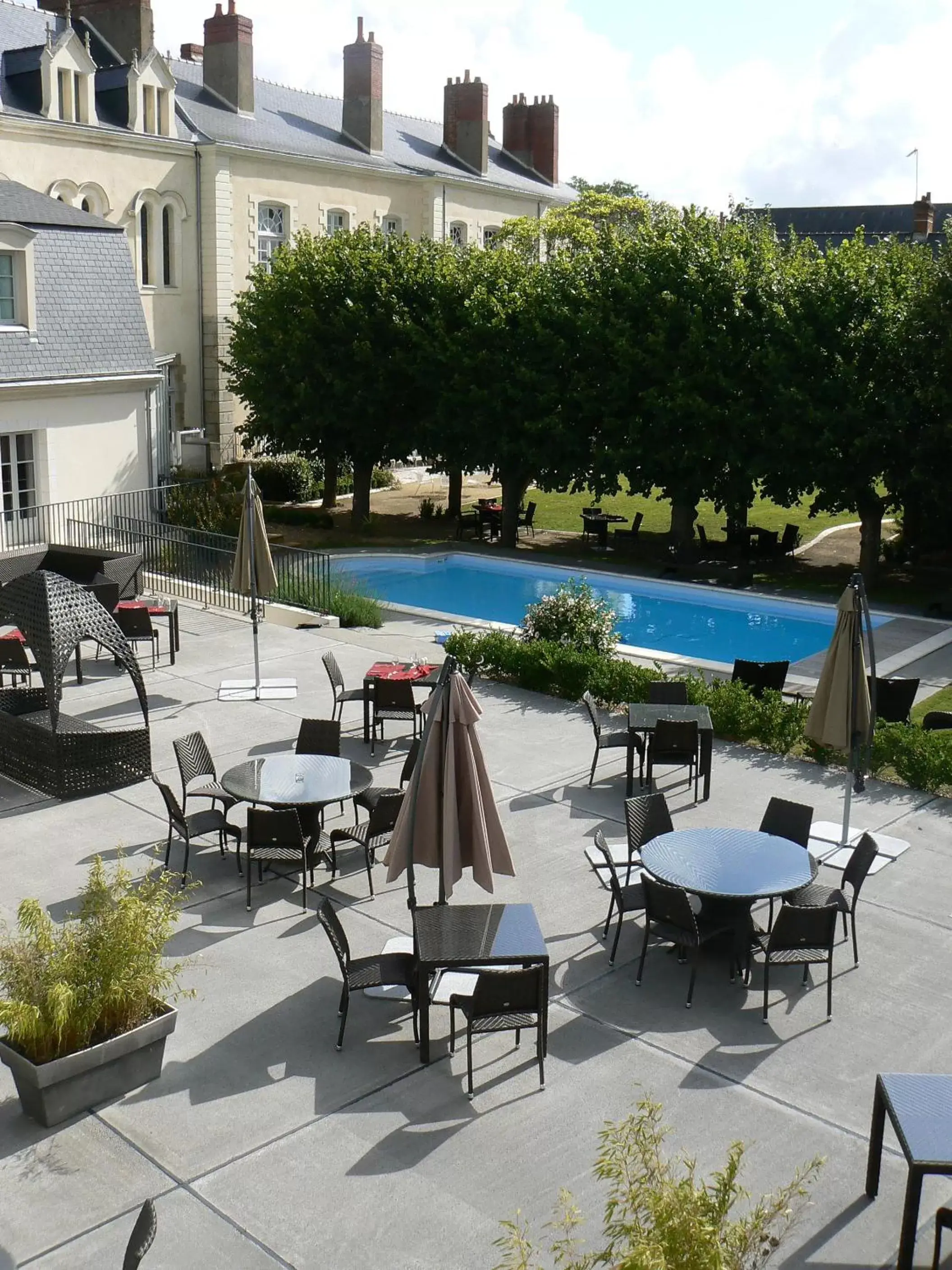 Balcony/Terrace, Swimming Pool in Hôtel & Spa Perier Du Bignon