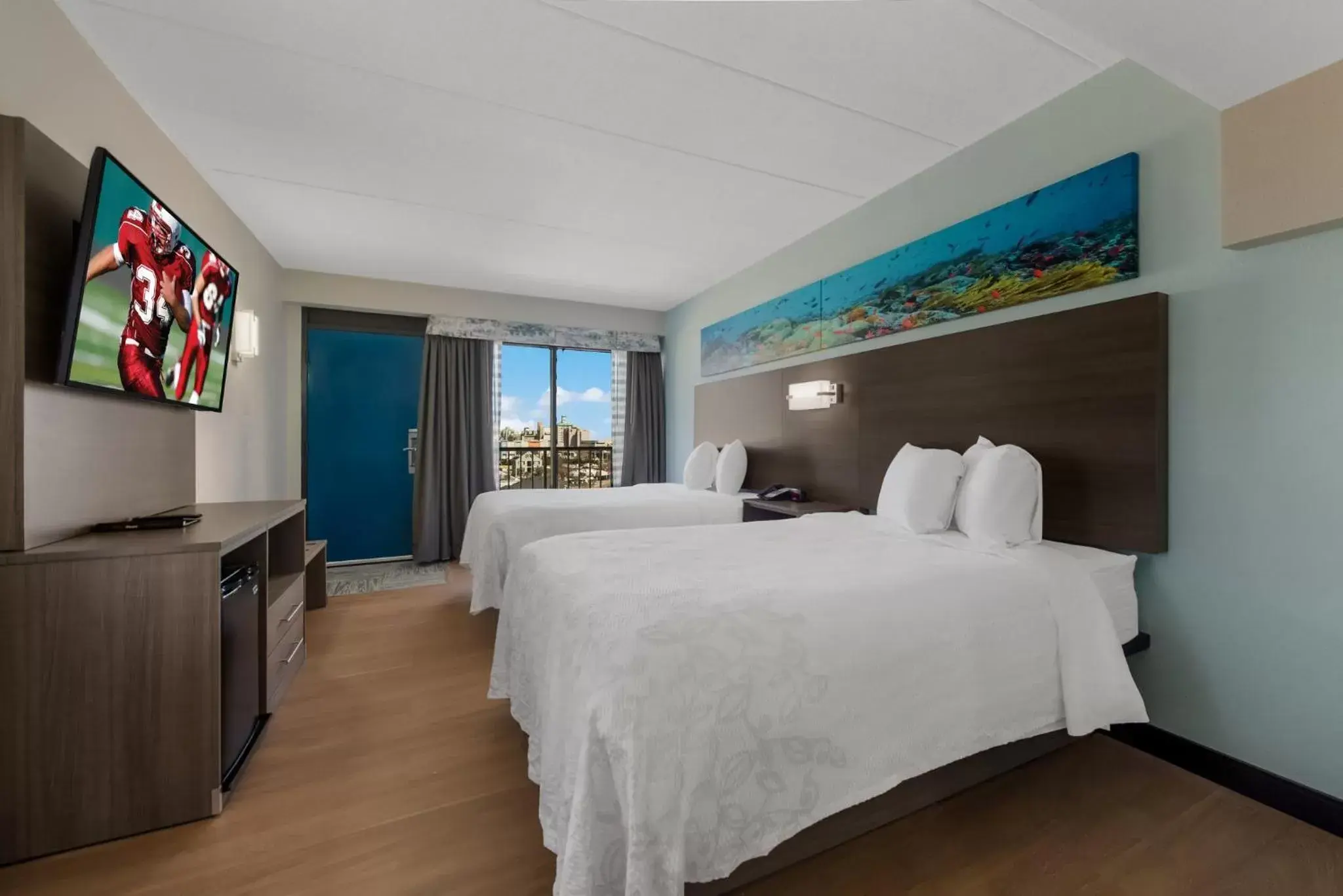 Bedroom in Red Roof PLUS & Suites Virginia Beach - Seaside