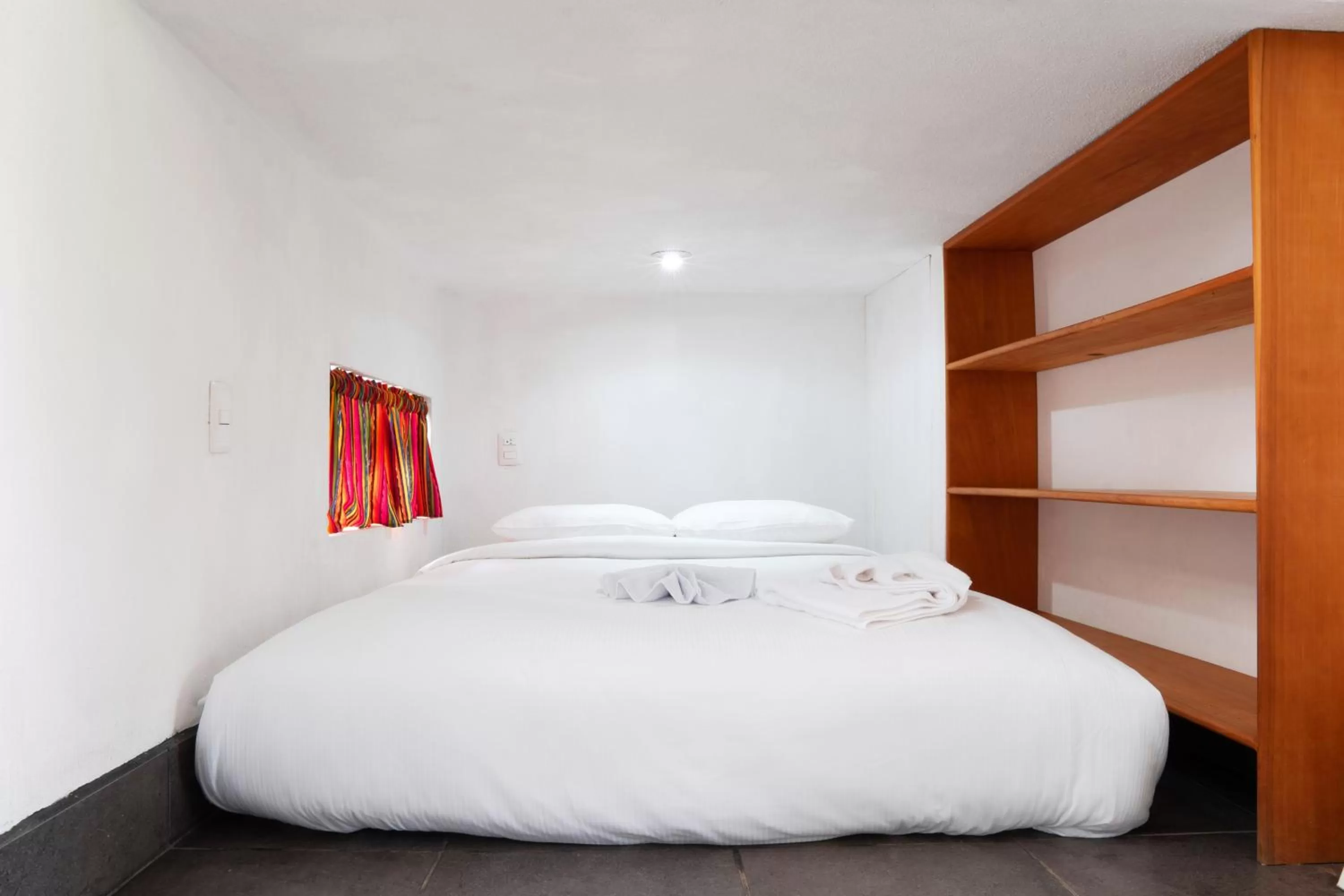 Bed in El Dragon Hotel