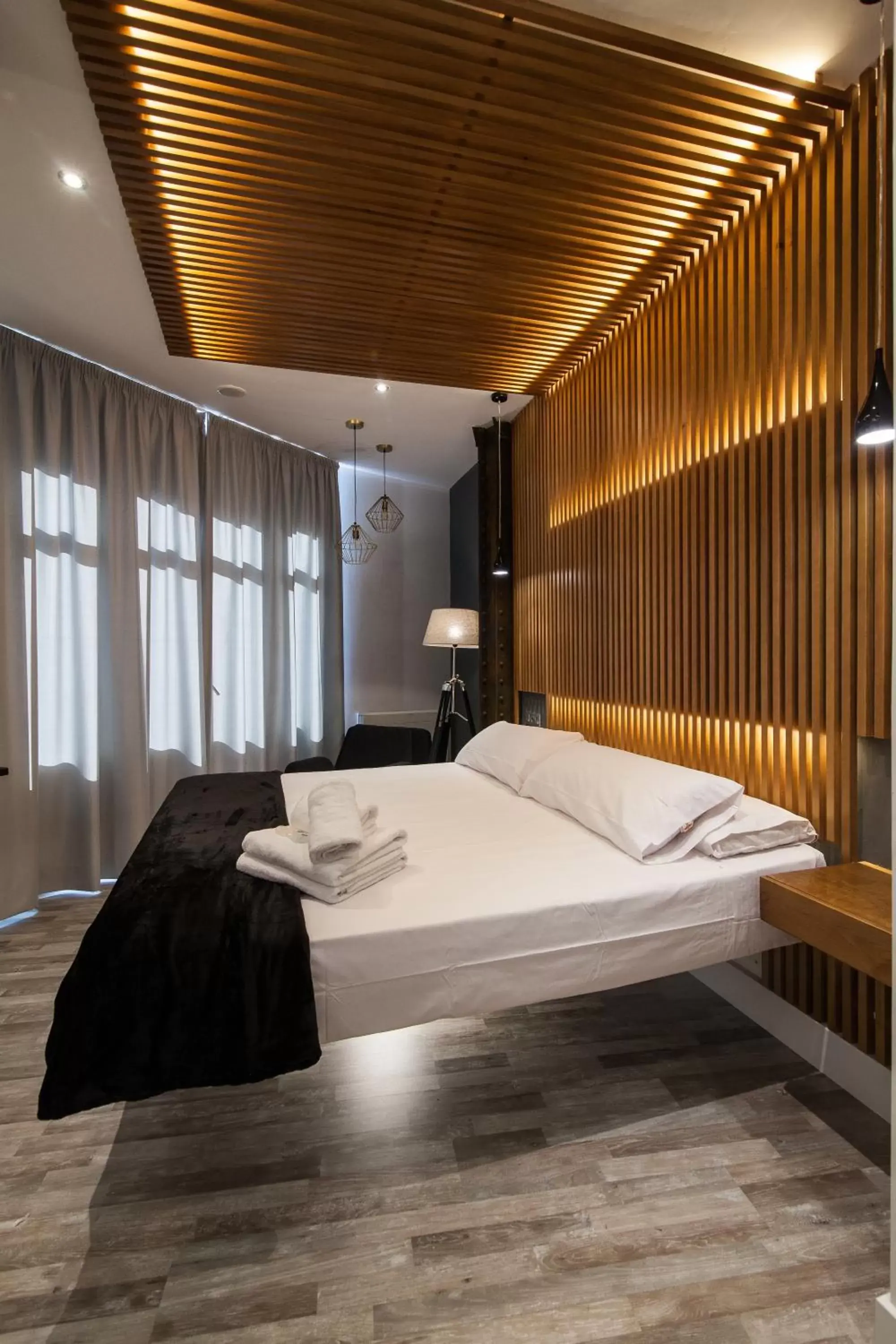 Bed in Vitium Urban Suites