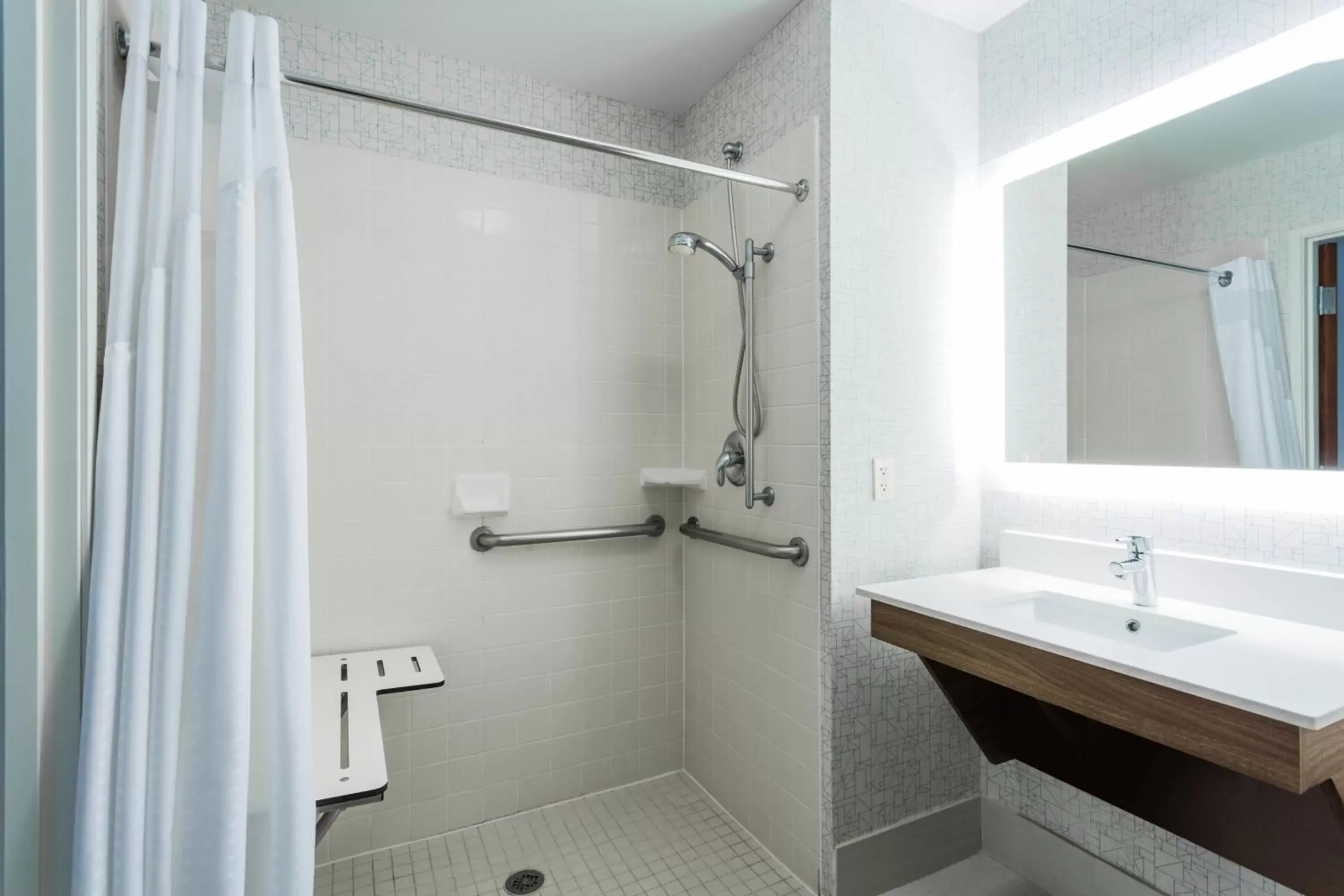 Bathroom in Holiday Inn Express Hotel and Suites Petersburg - Fort Lee, an IHG Hotel