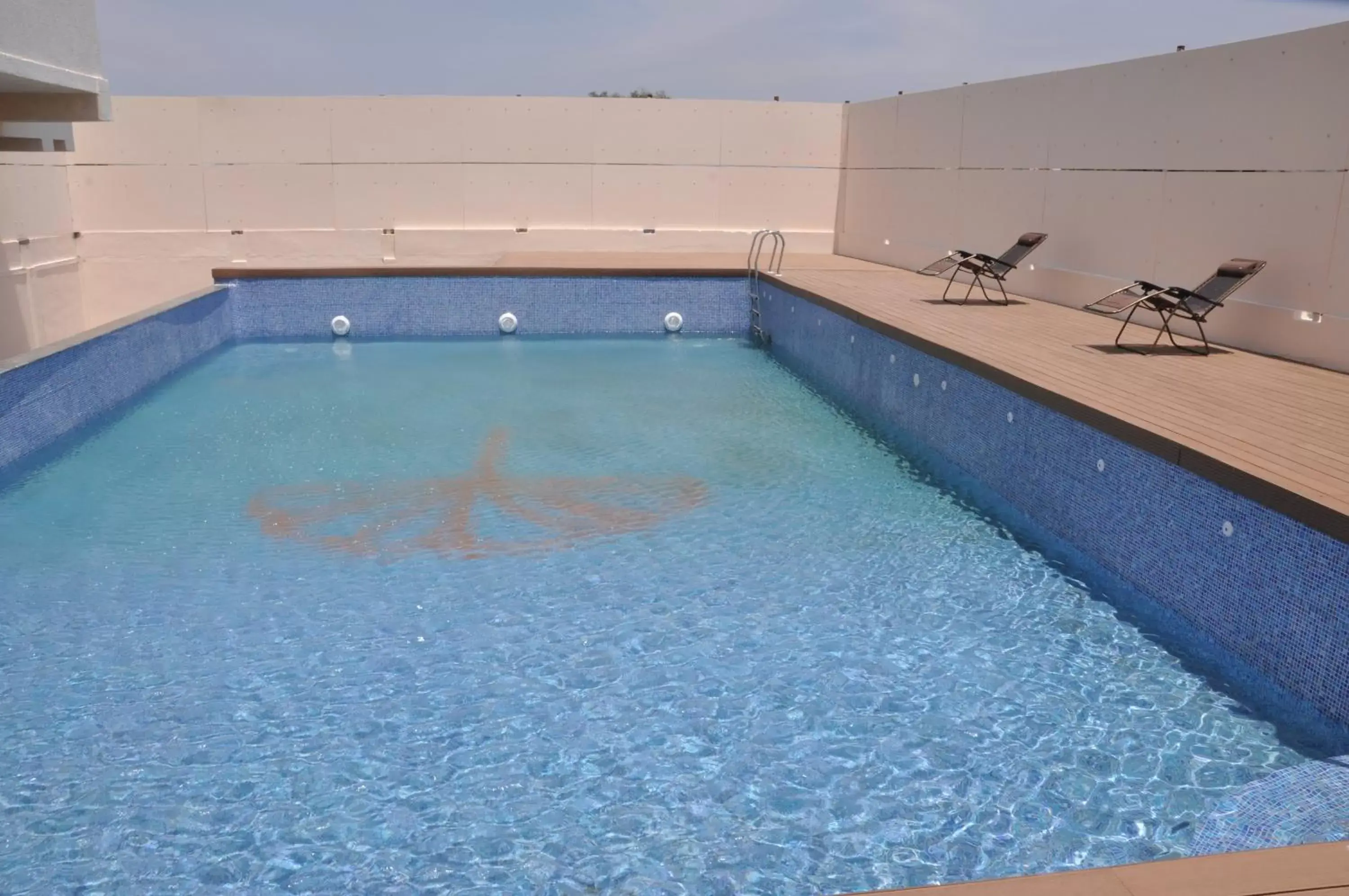 Swimming Pool in Poppys Hotel Madurai